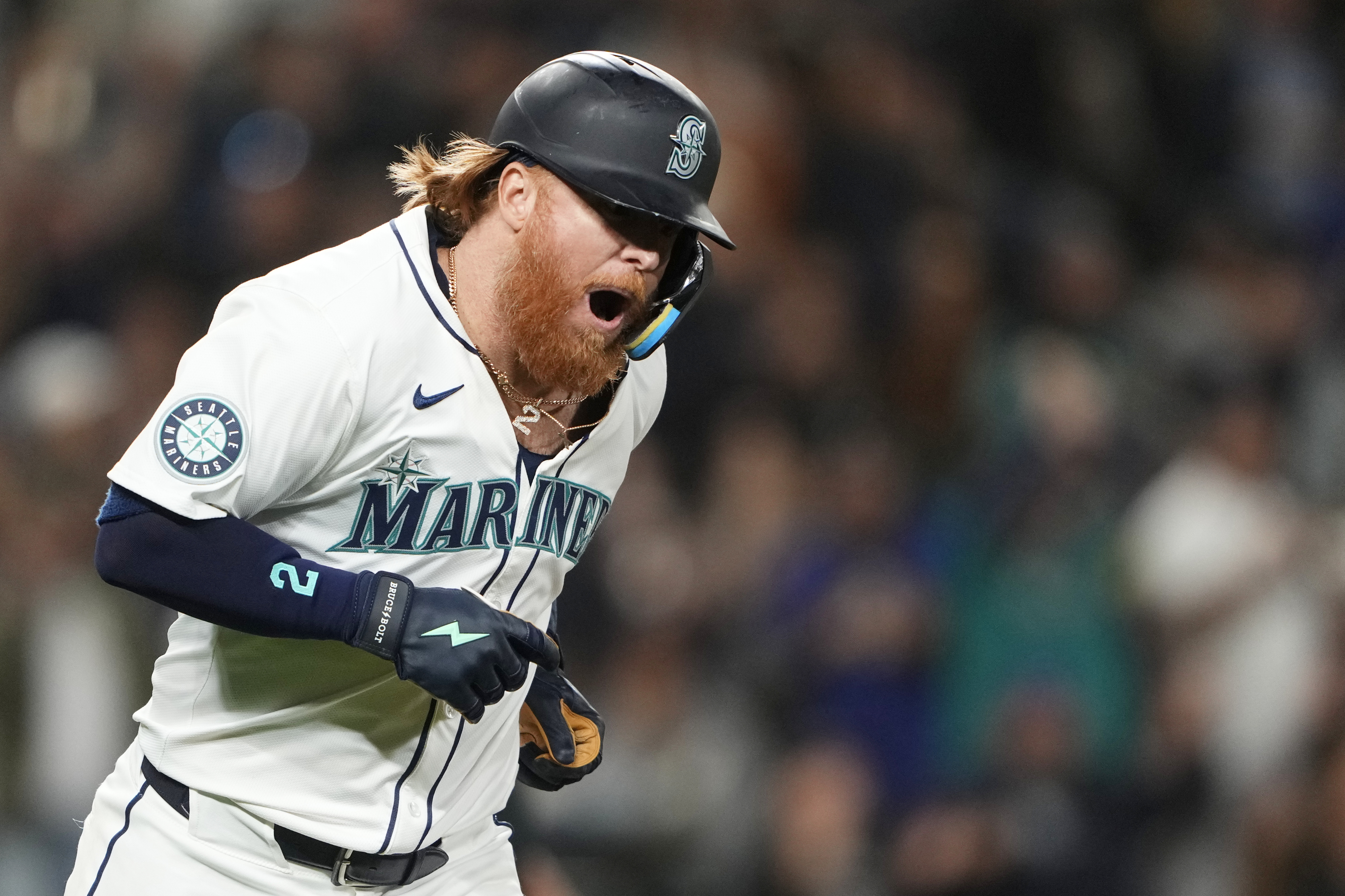 FILE - Seattle Mariners' Justin Turner reacts to hitting a solo home run against the New York Yankees during the eighth inning of a baseball game Wednesday, Sept. 18, 2024, in Seattle. 
