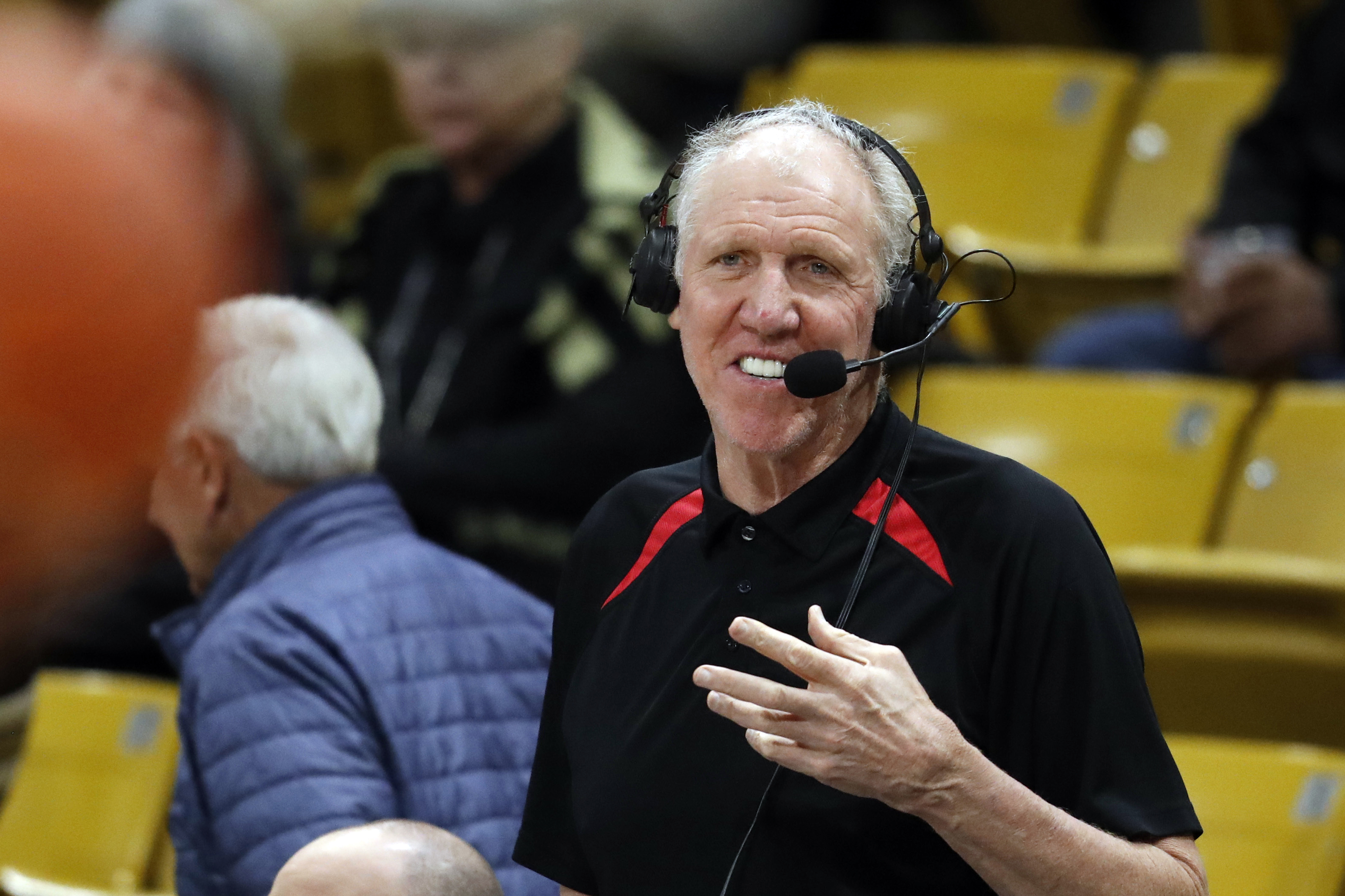 FILE - Broadcaster Bill Walton looks in during the first half of an NCAA college basketball game Thursday, March 7, 2019, in Boulder, Colo.