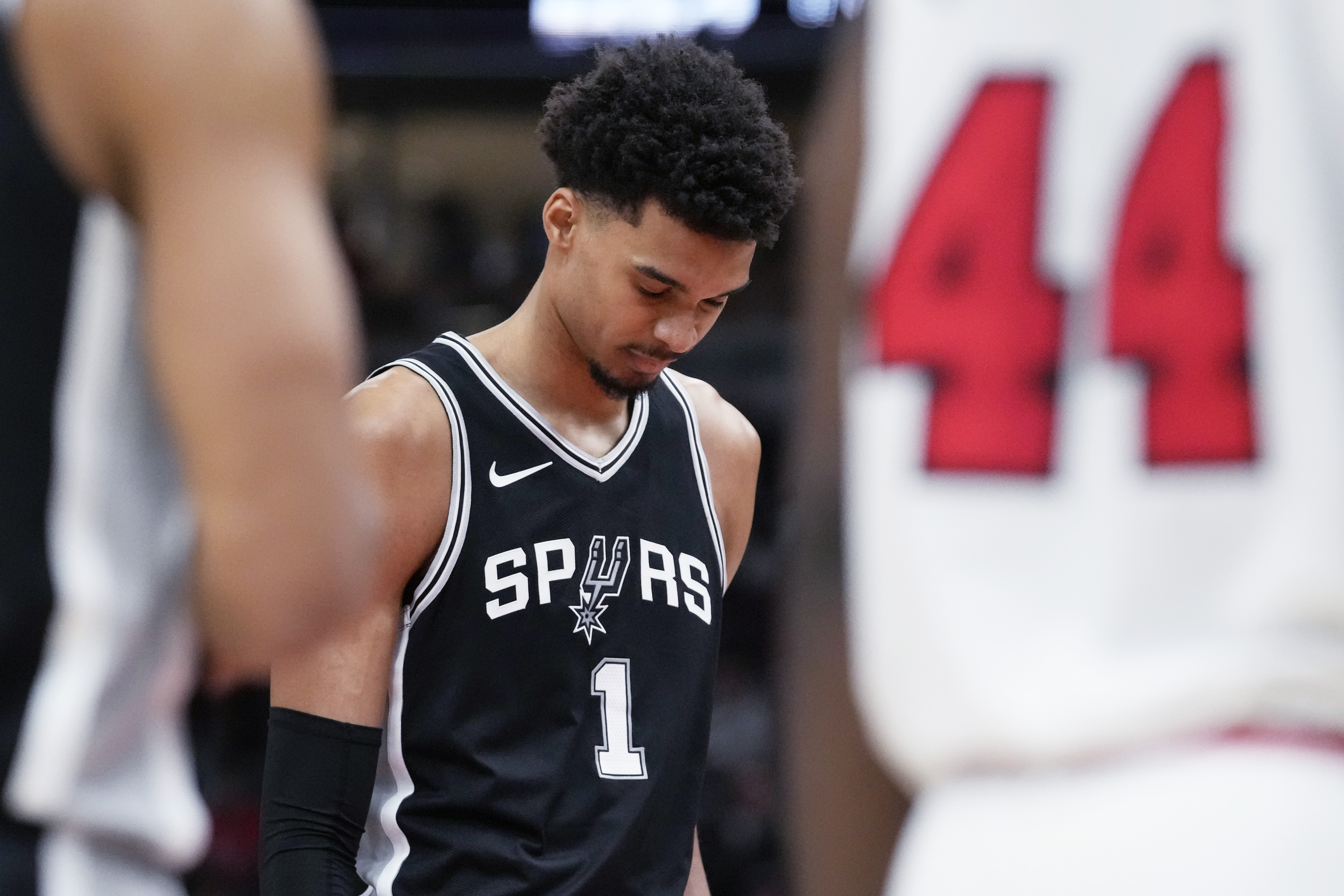 FILE - San Antonio Spurs center Victor Wembanyama reacts after a missed a free throw during the second half of an NBA basketball game against the Chicago Bulls in Chicago, Monday, Jan. 6, 2025. 