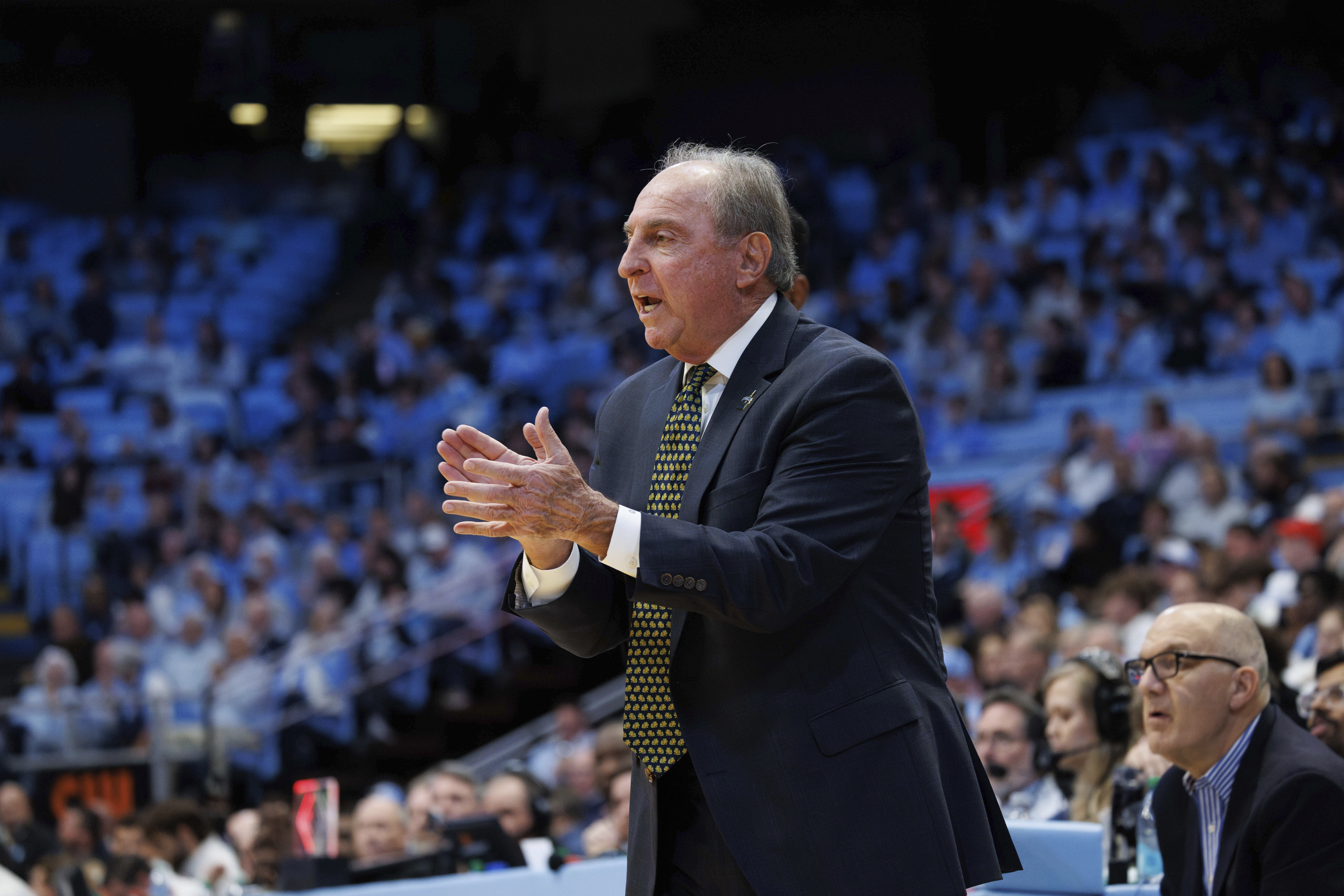 FILE - La Salle head coach Fran Dunphy claps from the sideline during the first half of an NCAA college basketball game against North Carolina in Chapel Hill, N.C., Saturday, Dec. 14, 2024. 