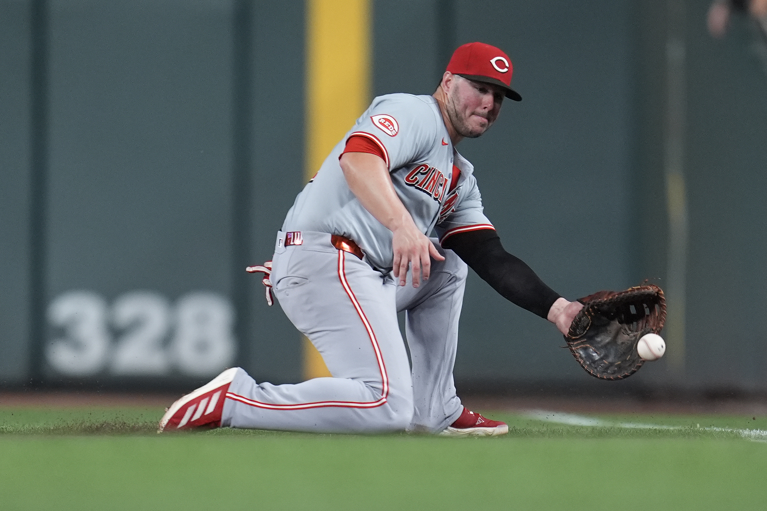 FILE - Cincinnati Reds first baseman Ty France (2) fields a groundout hit by Minnesota Twins' Brooks Lee during the sixth inning of a baseball game Saturday, Sept. 14, 2024, in Minneapolis. 