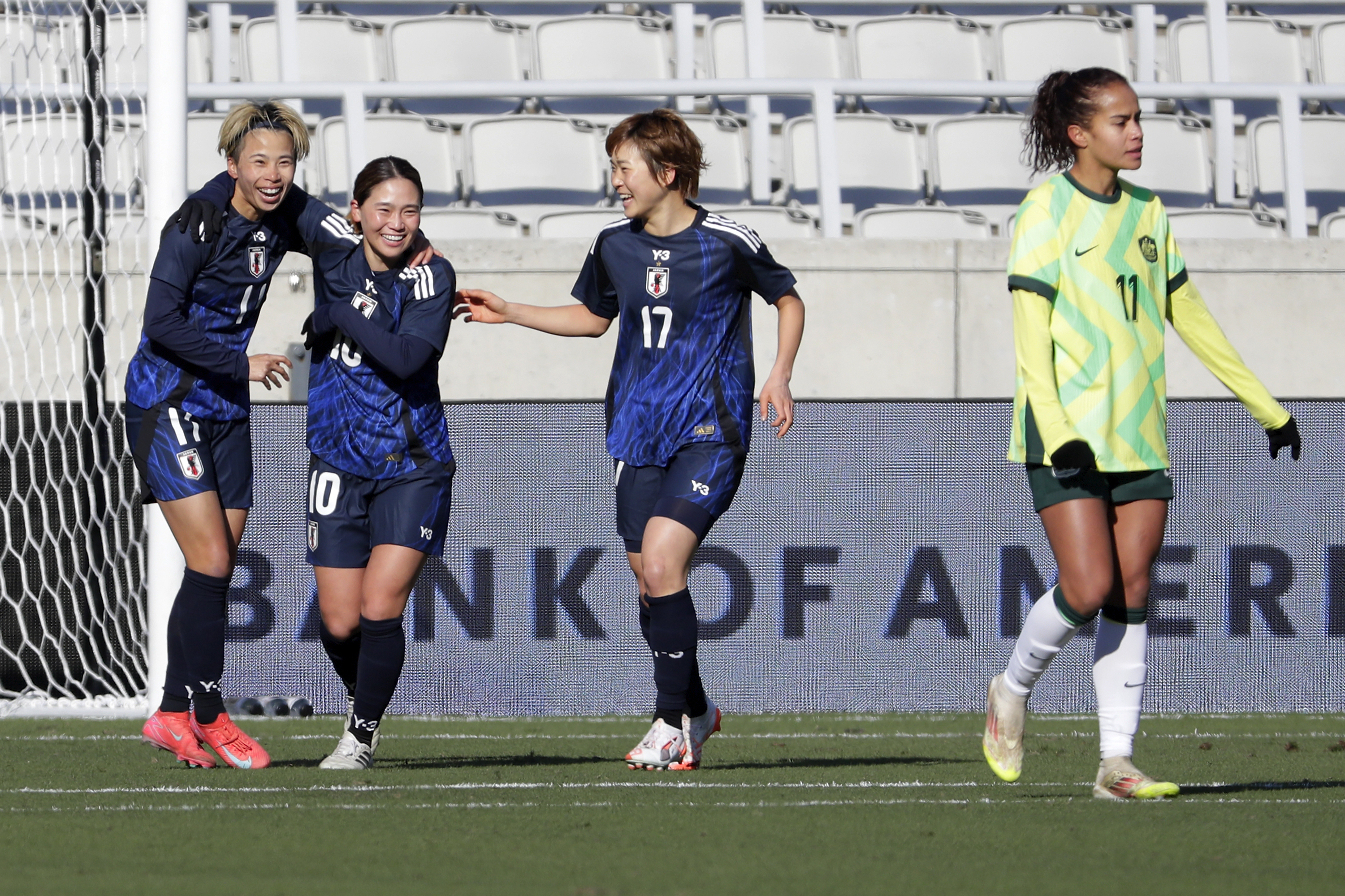 Japan's Mina Tanaka, left, Fuka Nagano (10) and Maika Hamano (17) celebrate after a goal by Tanaka as Australia forward Mary Fowler, right, walks away during the SheBelieves Cup women's soccer tournament, Thursday, Feb. 20, 2025, in Houston. 