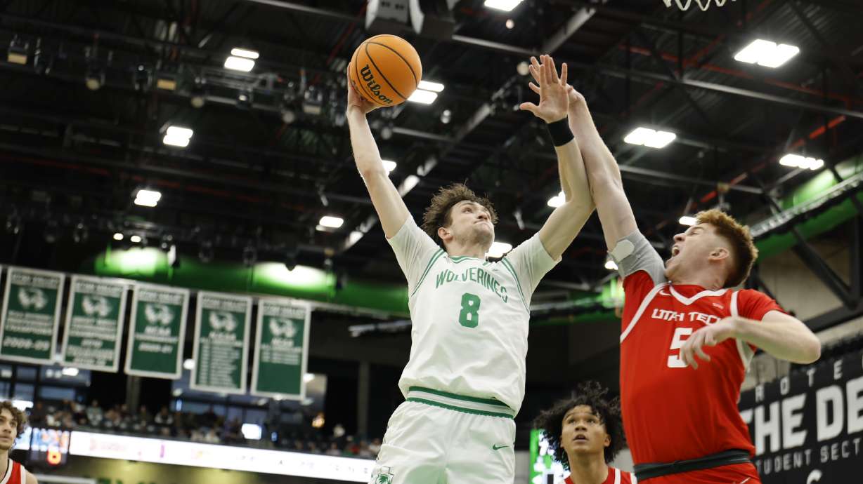 Hayden Welling attempting a posterizing dunk against Utah Tech.
