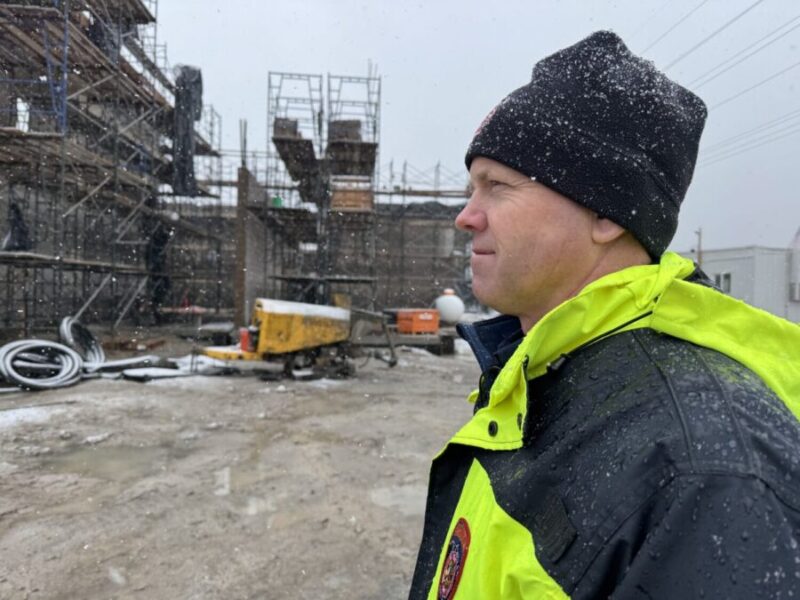 Sandy Fire Chief Ryan McConaghie views progress at the new fire station under construction.