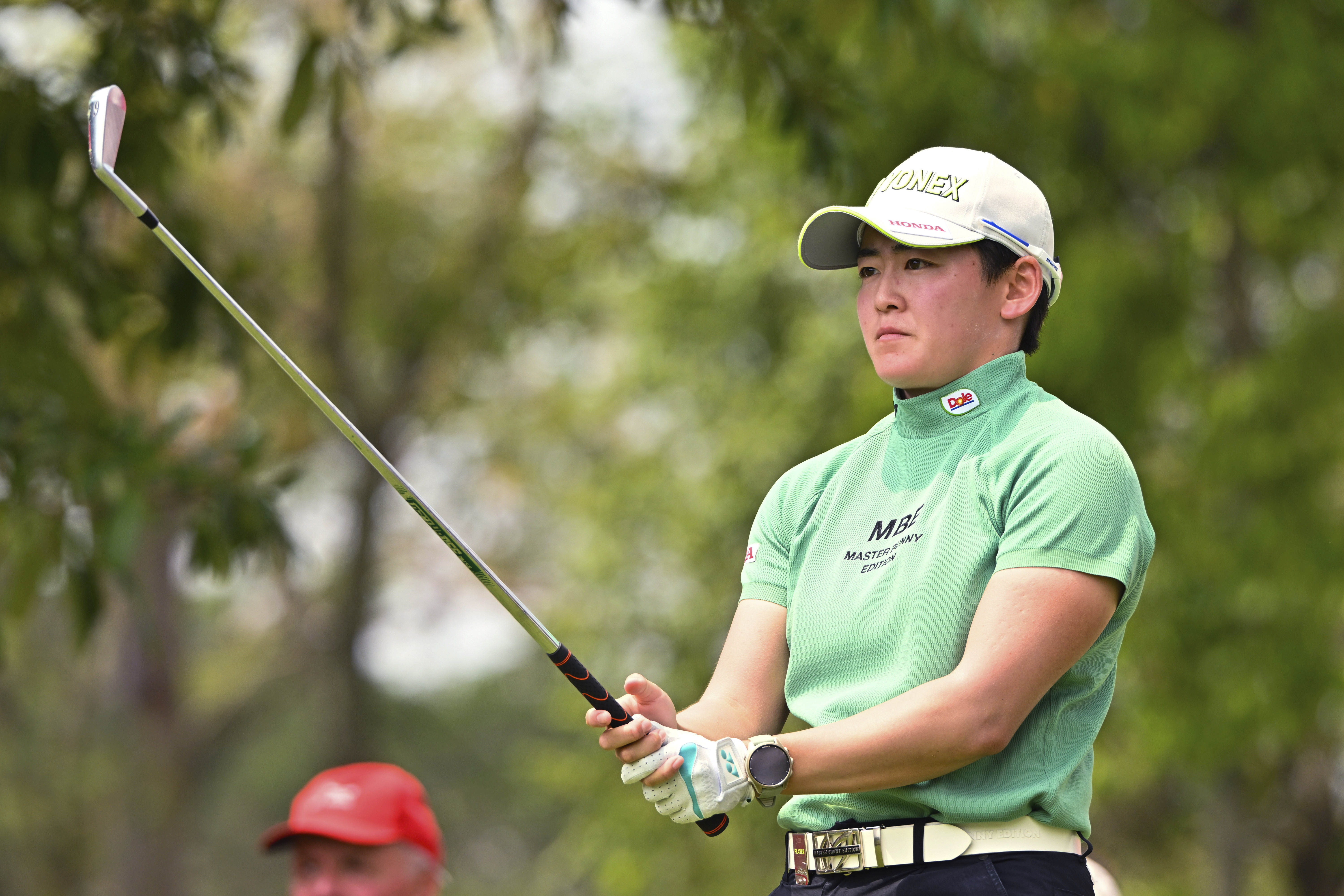 Akie Iwai of Japan prepares for her shot on the 16th hole during the first round of the LPGA Honda Thailand golf tournament in Pattaya, southern Thailand, Thursday, Feb. 20, 2025. 
