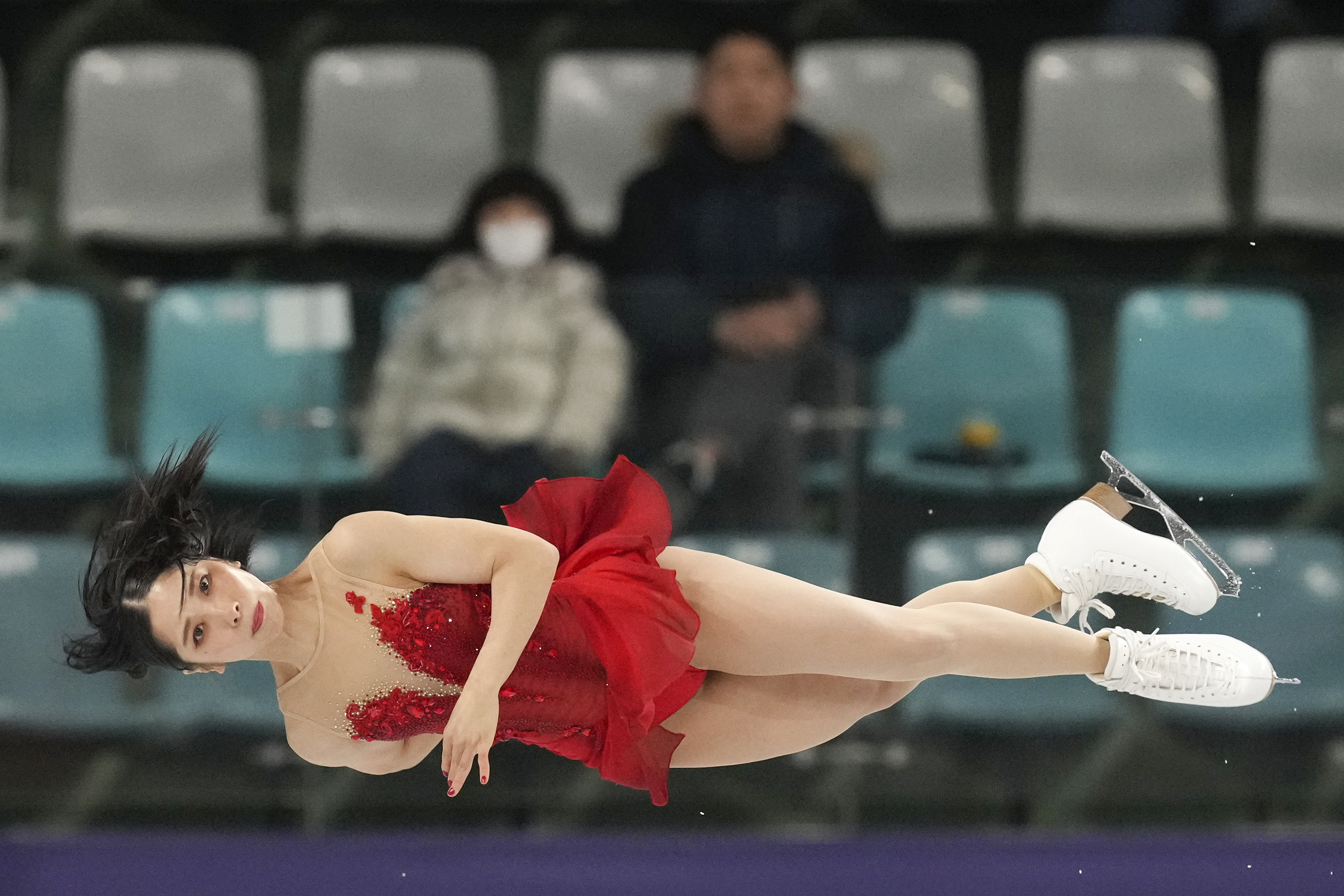 Japan's Riku Miura perform with Ryuichi Kihara, not seen, during the pairs free skating at the ISU Four Continents Figure Skating Championships at the Mokdong ice rink in Seoul, South Korea, Friday, Feb. 21, 2025. 