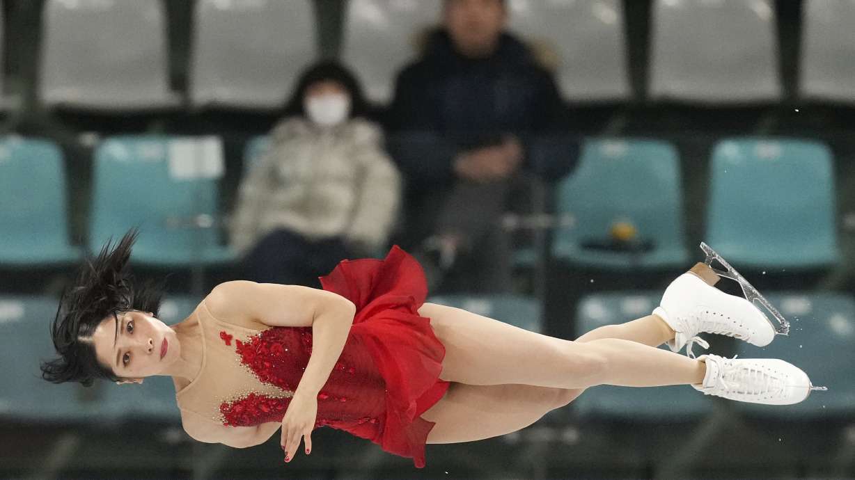 Japan's Riku Miura perform with Ryuichi Kihara, not seen, during the pairs free skating at the ISU Four Continents Figure Skating Championships at the Mokdong ice rink in Seoul, South Korea, Friday, Feb. 21, 2025.
