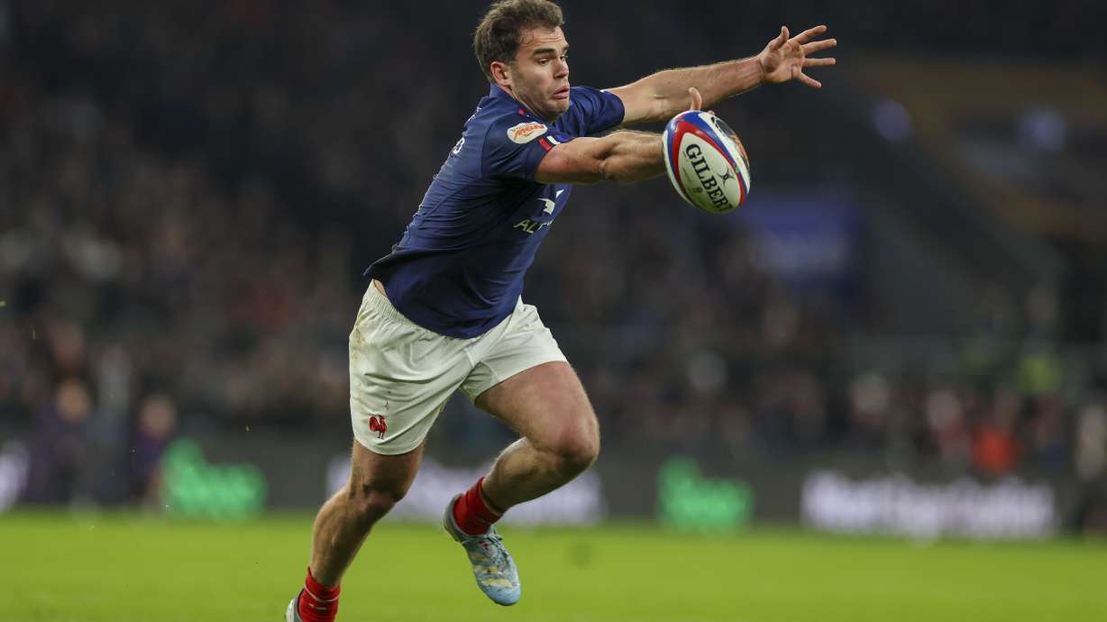 France's Damian Penaud drops the ball during the Six Nations rugby union match between England and France at Twickenham in London, Saturday, Feb. 8, 2025.