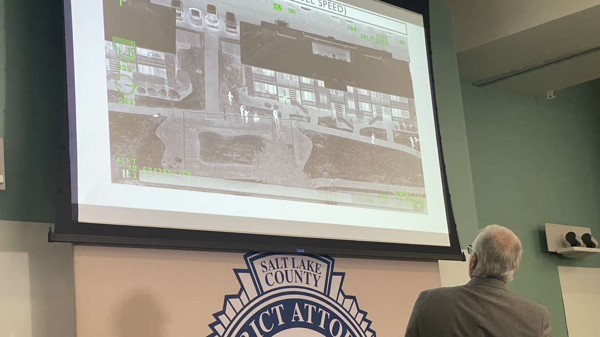Salt Lake County District Attorney Sim Gill on Friday shows video recorded from a helicopter on Feb. 7, 2024, showing American Fork SWAT members confronting Kevin Mitchell Ballew at a South Salt Lake apartment complex.