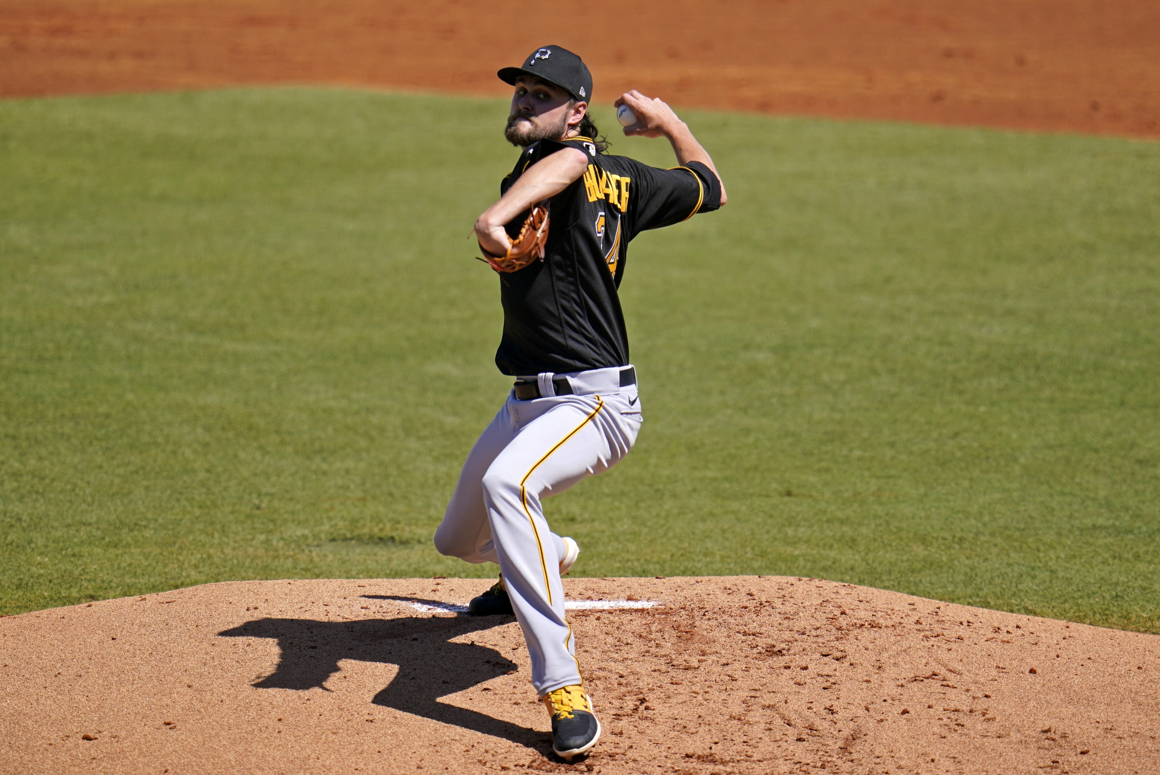 FILE - Pittsburgh Pirates pitcher JT Brubaker delivers during the first inning of a spring training exhibition baseball game against the New York Yankees in Tampa, Fla., Saturday, March 13, 2021. 