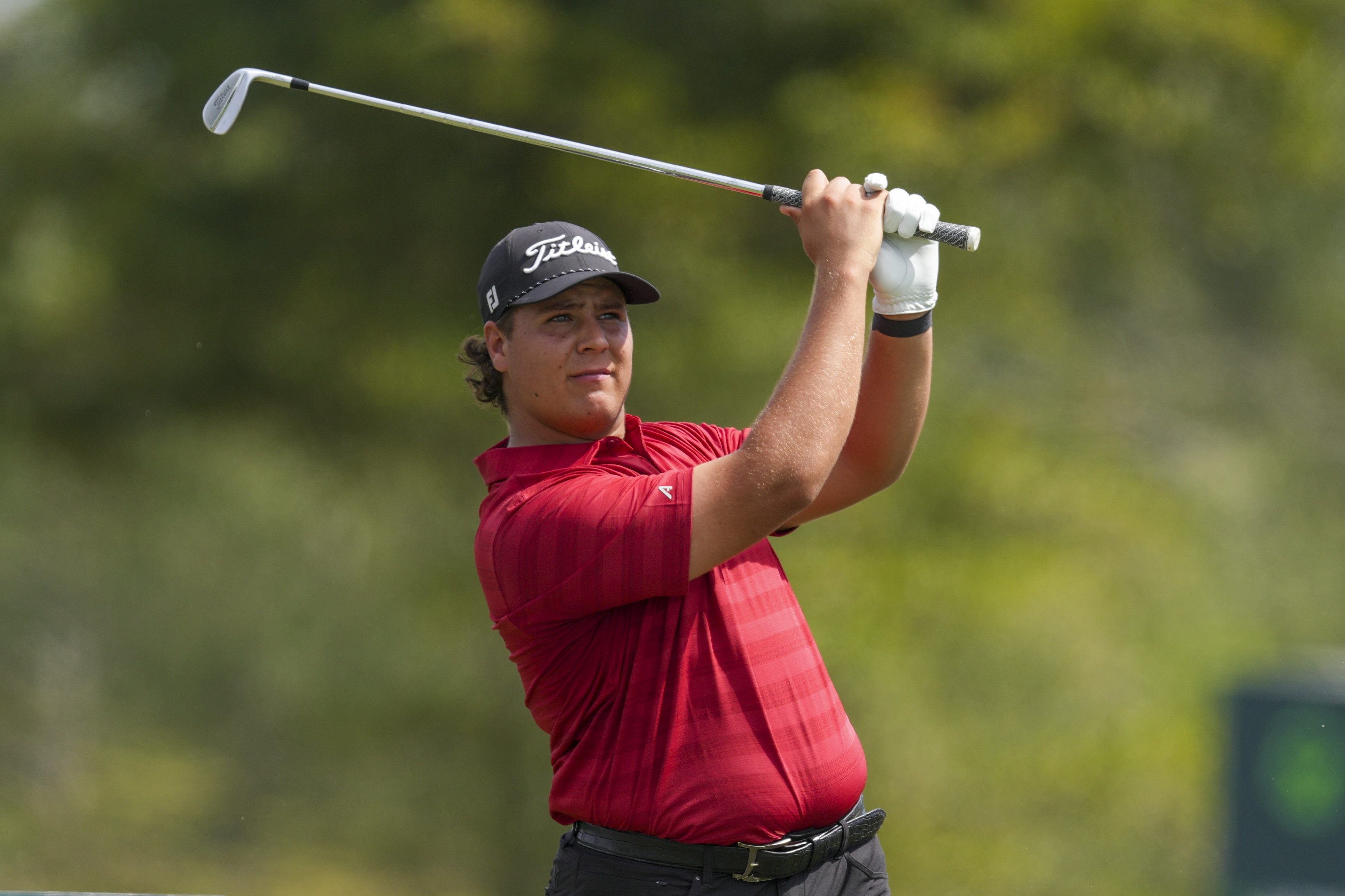Aldrich Potgieter, of South Africa, watches his tee shot on the 13th hole during the second round of the Mexico Open golf tournament in Puerto Vallarta, Mexico, Friday, Feb. 21, 2025. 