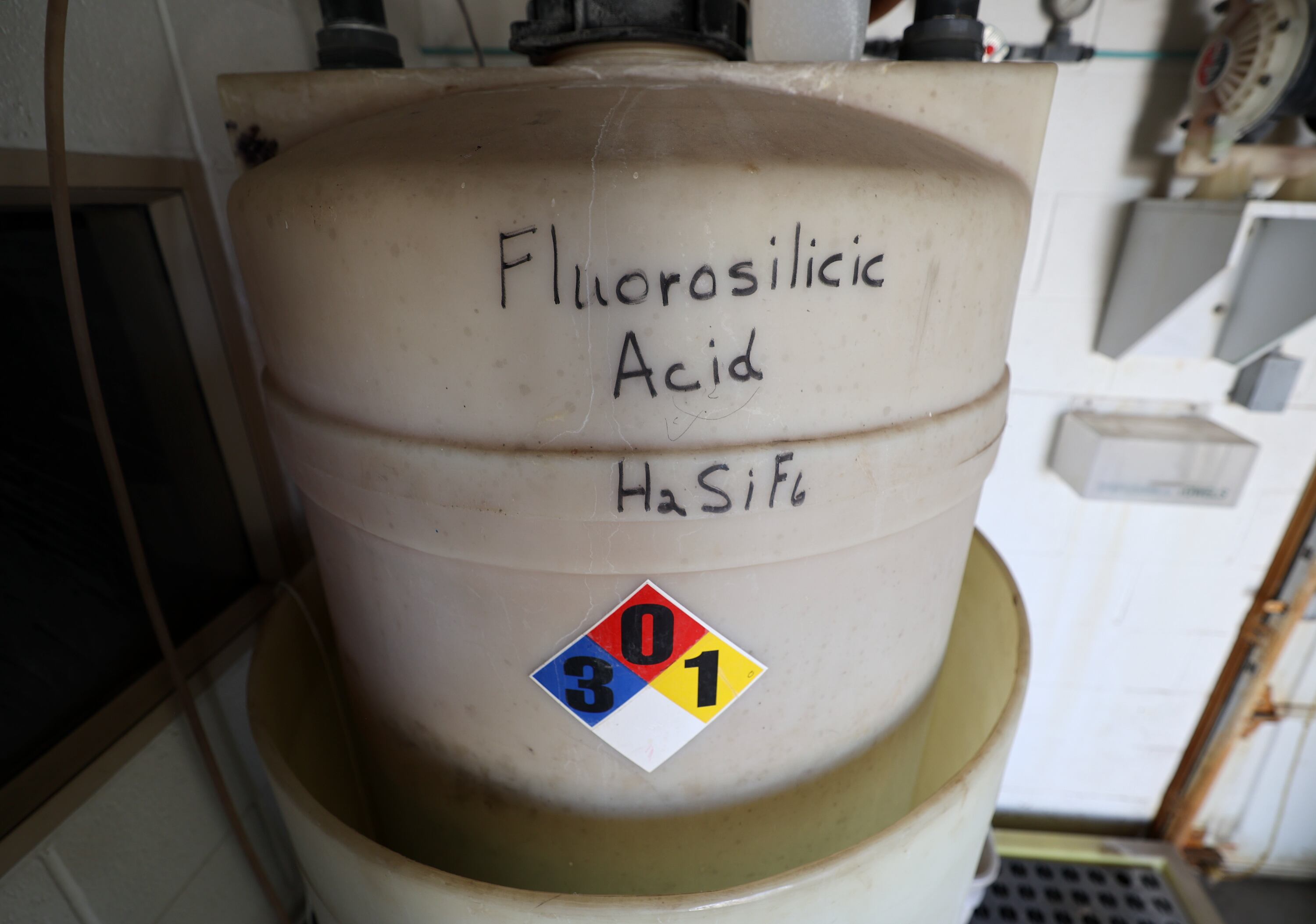 A tank holds fluorosilicic acid to fluoridate water at the fluoridation station at the Fairfield Well in Layton on Sept. 27, 2024. A controversial bill to prohibit the introduction of fluoride into public drinking water systems in Utah passed the Senate Friday and is destined to become a new law if Gov. Spencer Cox signs it.