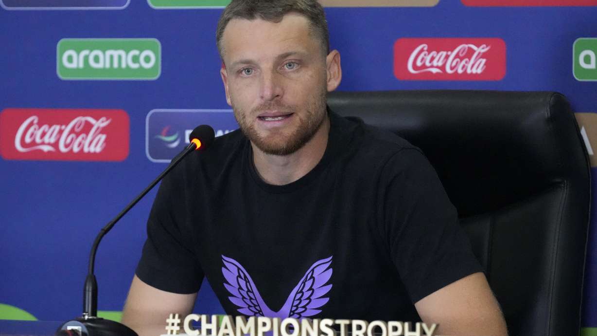 England's captain Jos Buttler speaks during a press conference regarding their ICC Champions Trophy cricket match against Australia, in Lahore, Pakistan, Friday, Feb. 21, 2025.