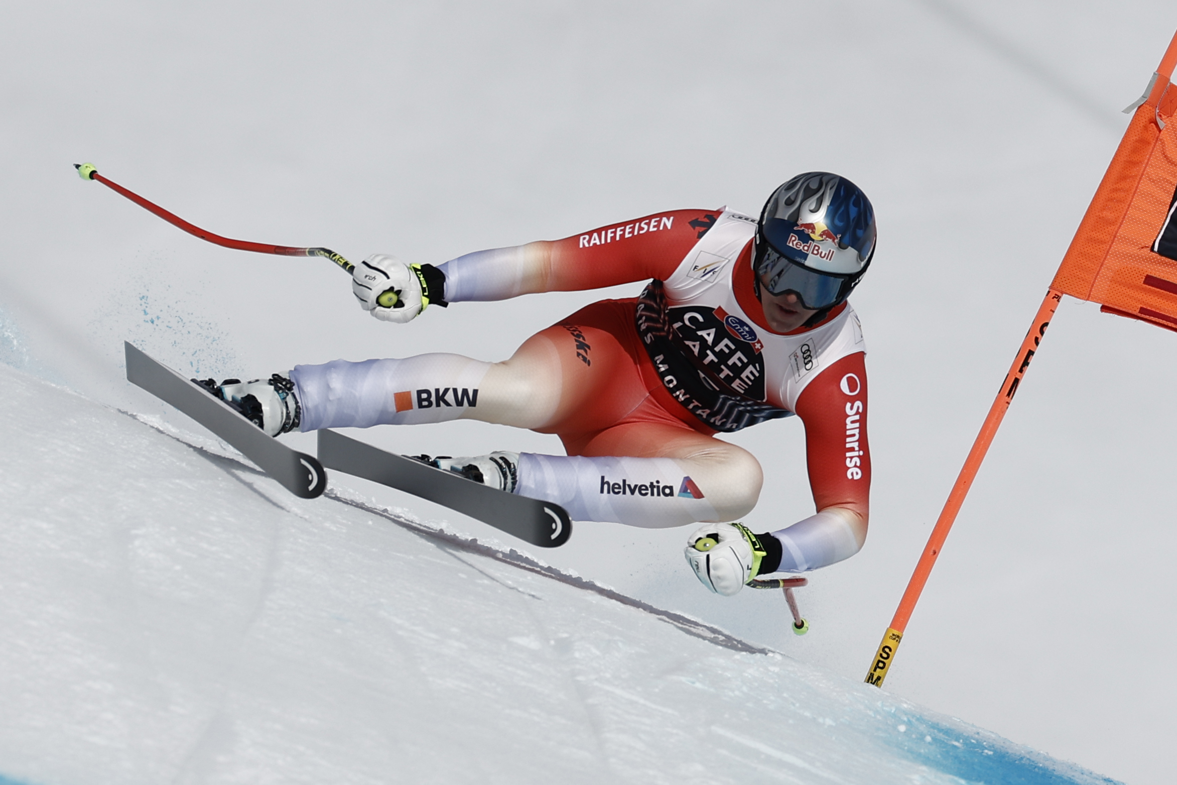 Switzerland's Franjo von Allmen speeds down the course during an alpine ski, men's World Cup downhill, in Crans Montana, Switzerland, Saturday, Feb. 22, 2025.