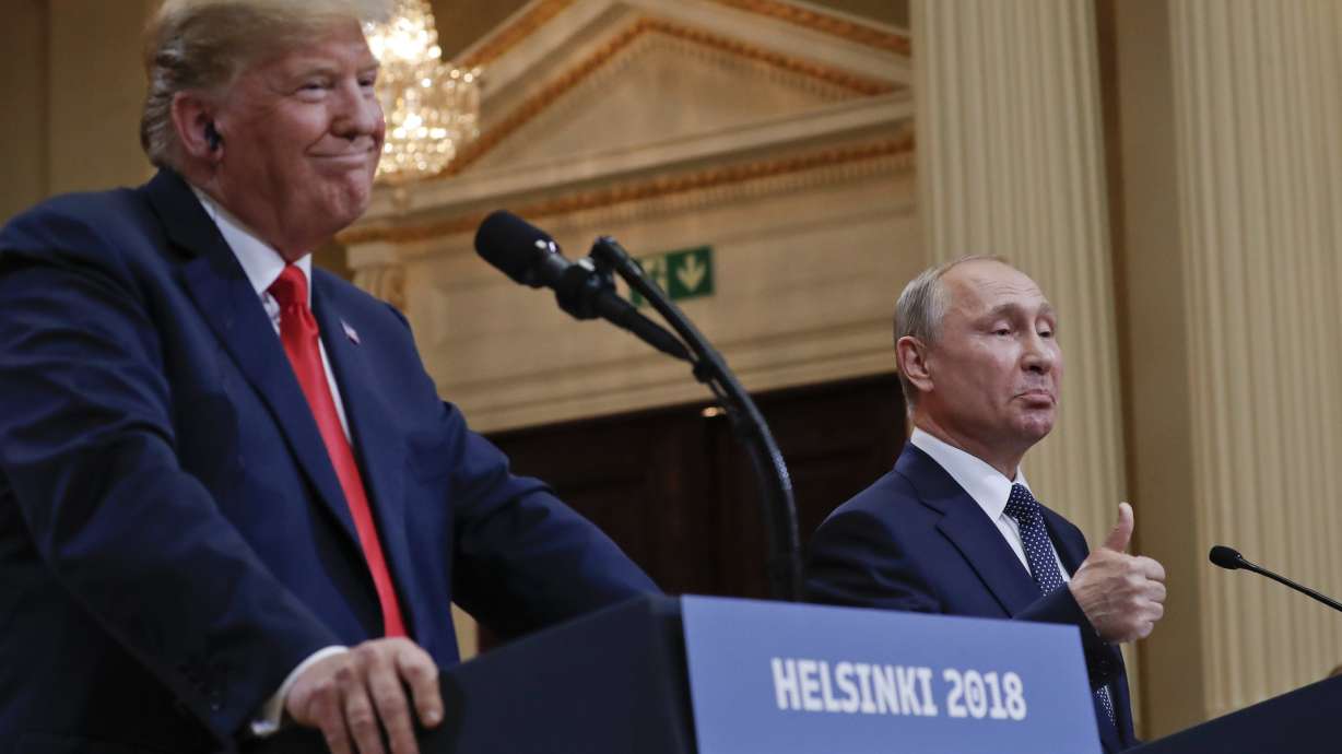 Russian President Vladimir Putin, right, and U.S. President Donald Trump give a joint news conference at the Presidential Palace in Helsinki, Finland, July 16, 2018. Preparations are underway for a face-to-face meeting between the two presidents, Russia's deputy foreign minister said Saturday.