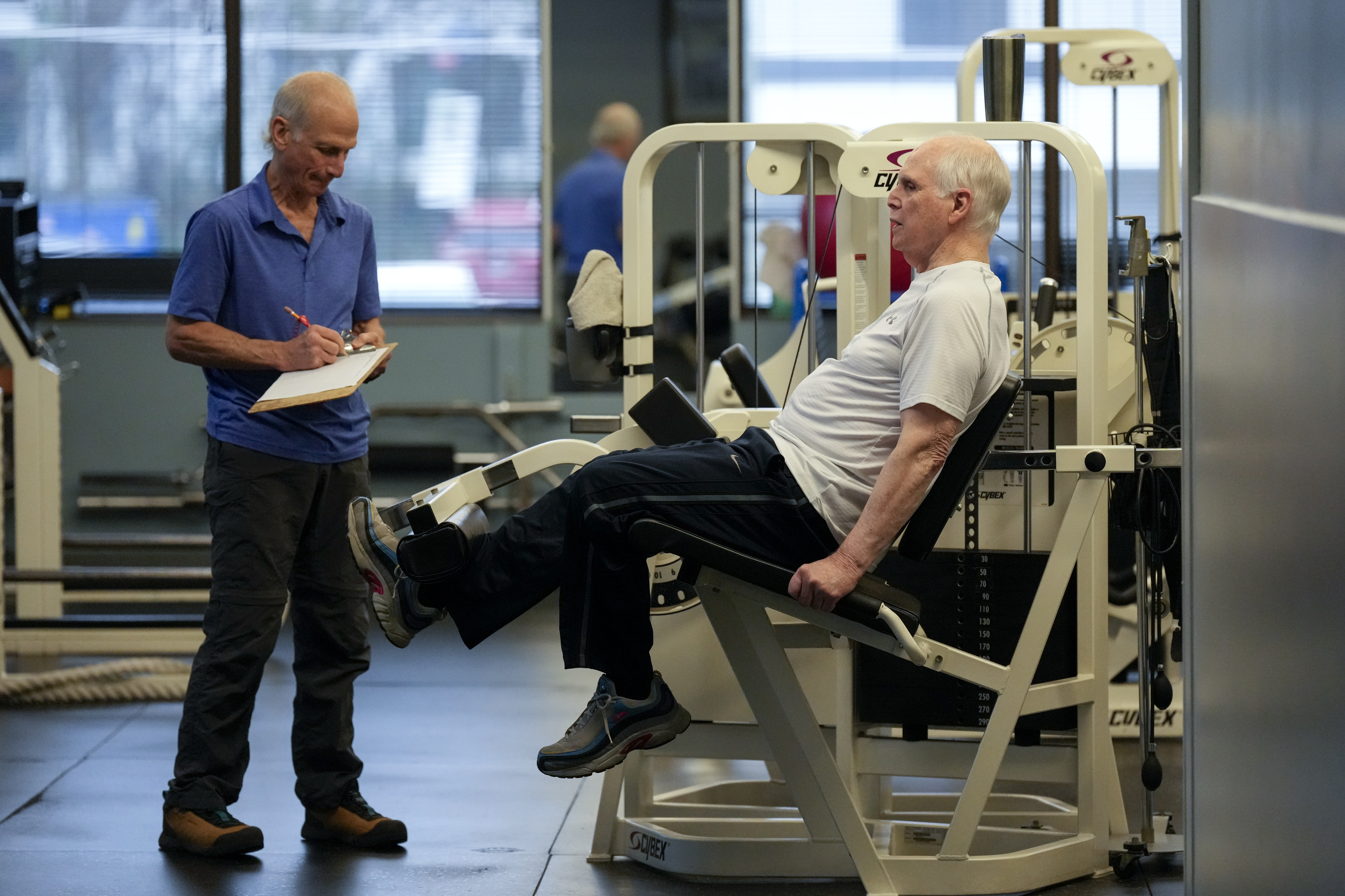 Dr. Grover Smith, right, works out with exercise scientist Dr. Irv Rubenstein, left, at STEPS Fitness, Wednesday, Feb. 12, 2025, in Nashville, Tenn. 