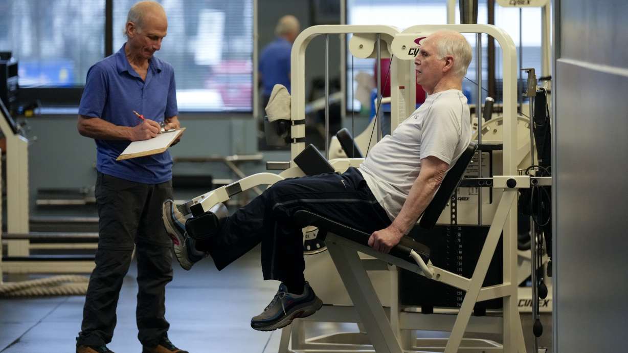 Dr. Grover Smith, right, works out with exercise scientist Dr. Irv Rubenstein, left, at STEPS Fitness, Wednesday, Feb. 12, 2025, in Nashville, Tenn.