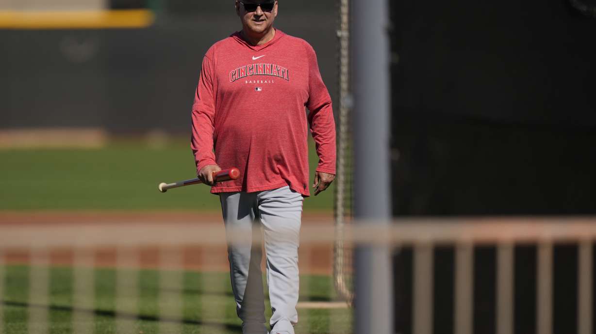 Cincinnati Reds manager Terry Francona walks across a field during spring training baseball practice at the team's training facility in Goodyear, Ariz., Saturday, Feb. 15, 2025.