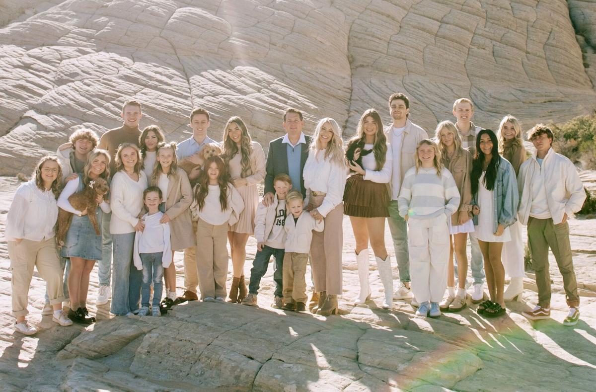 The Nelson family smiles together for a family photo, location and date not specified. This YouTube family opened not one but three businesses inside Red Cliffs Mall.