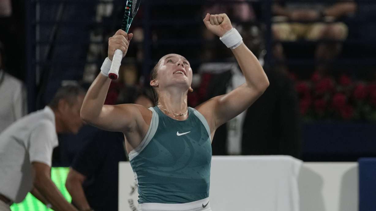 Russia's Mirra Andreeva reacts after winning the Dubai Duty Free Tennis Championship final match against Denmark's Clara Tauson in Dubai, United Arab Emirates, on Saturday, Feb. 22, 2025.