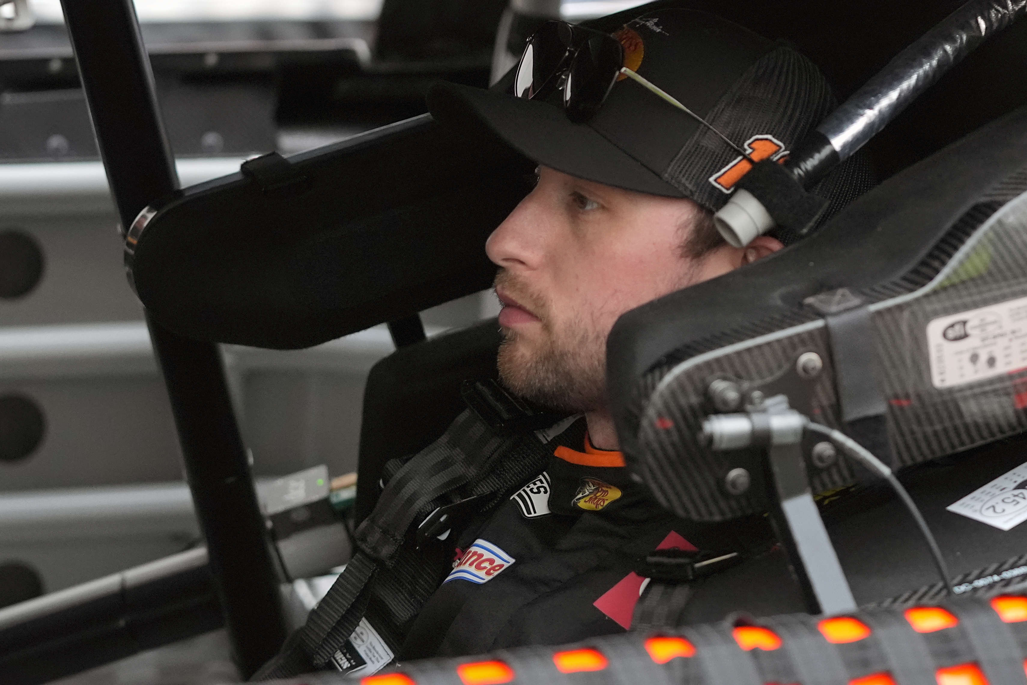 Chase Briscoe waits while his crew makes adjustments to his car during a practice session for the NASCAR Daytona 500 auto race at Daytona International Speedway, Friday, Feb. 14, 2025, in Daytona Beach, Fla.