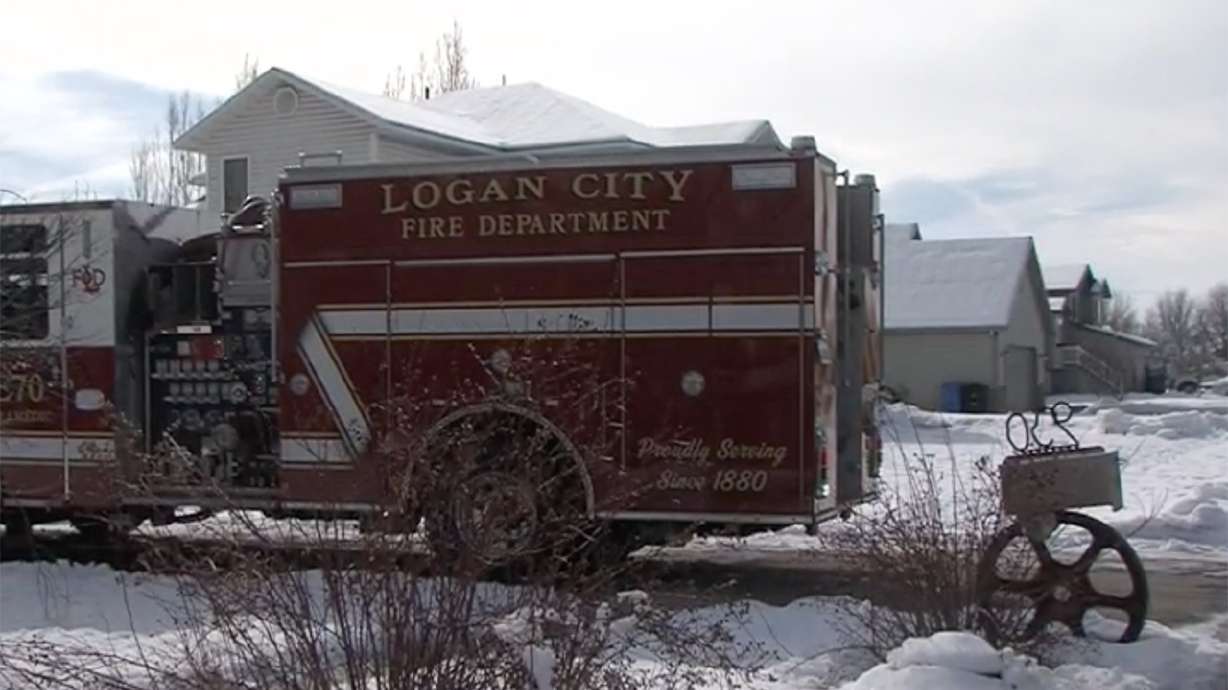 Fire and police respond to a structure fire near 900 West and 1000 South in Logan about 7:45 a.m. Saturday. One woman was found dead inside the residence.