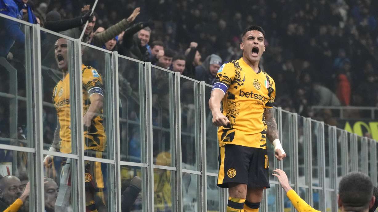 Inter Milan's Lautaro Martinez celebrates after scoring his side's opening goal during a Serie A soccer match between Inter Milan and Genoa, at the San Siro stadium in Milan, Italy, Saturday, Feb. 22, 2025.