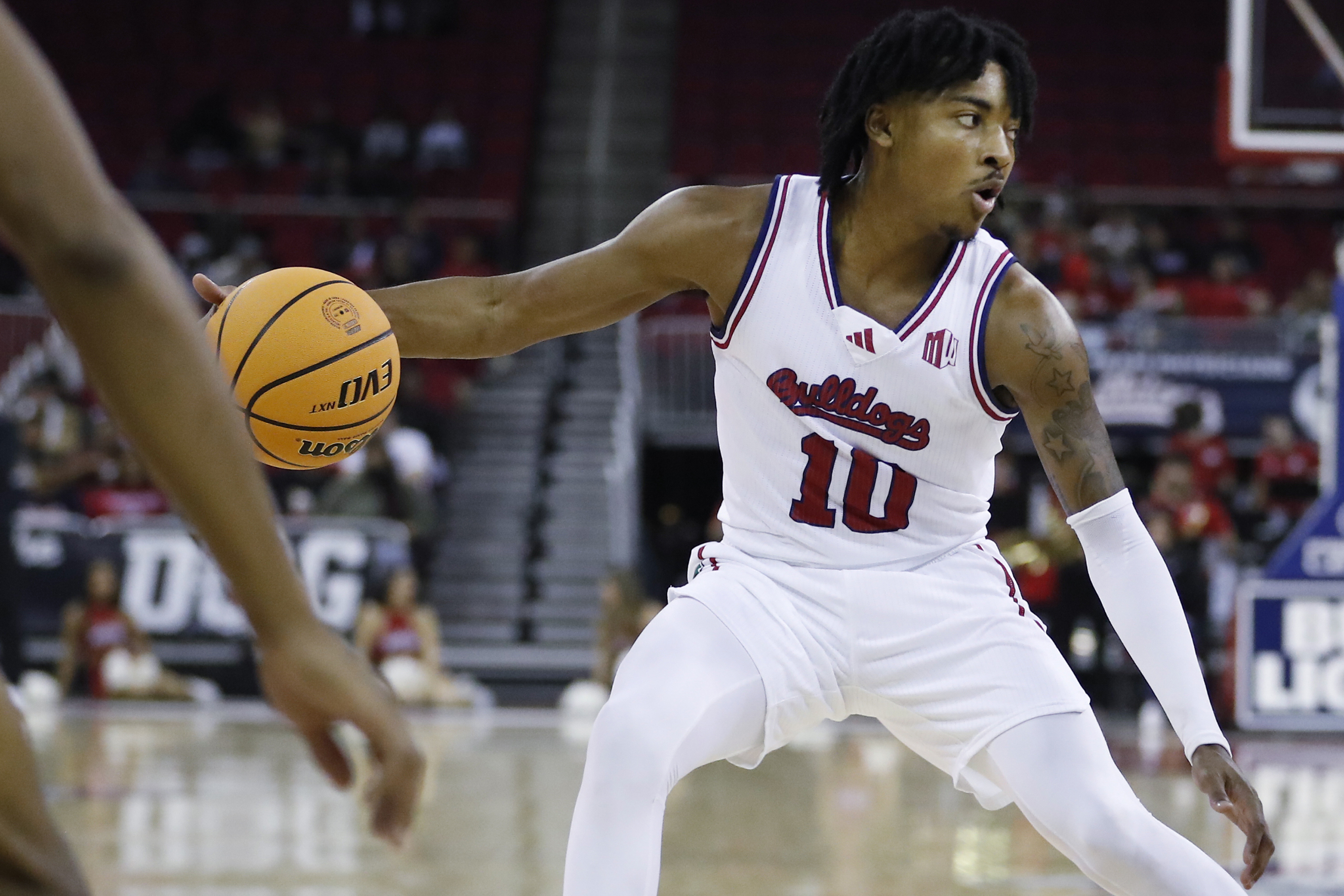 FILE - Fresno State's Zaon Collins looks for a teammate against San Diego State during the second half of an NCAA college basketball game in Fresno, Calif., Wednesday, Dec. 4, 2024. 
