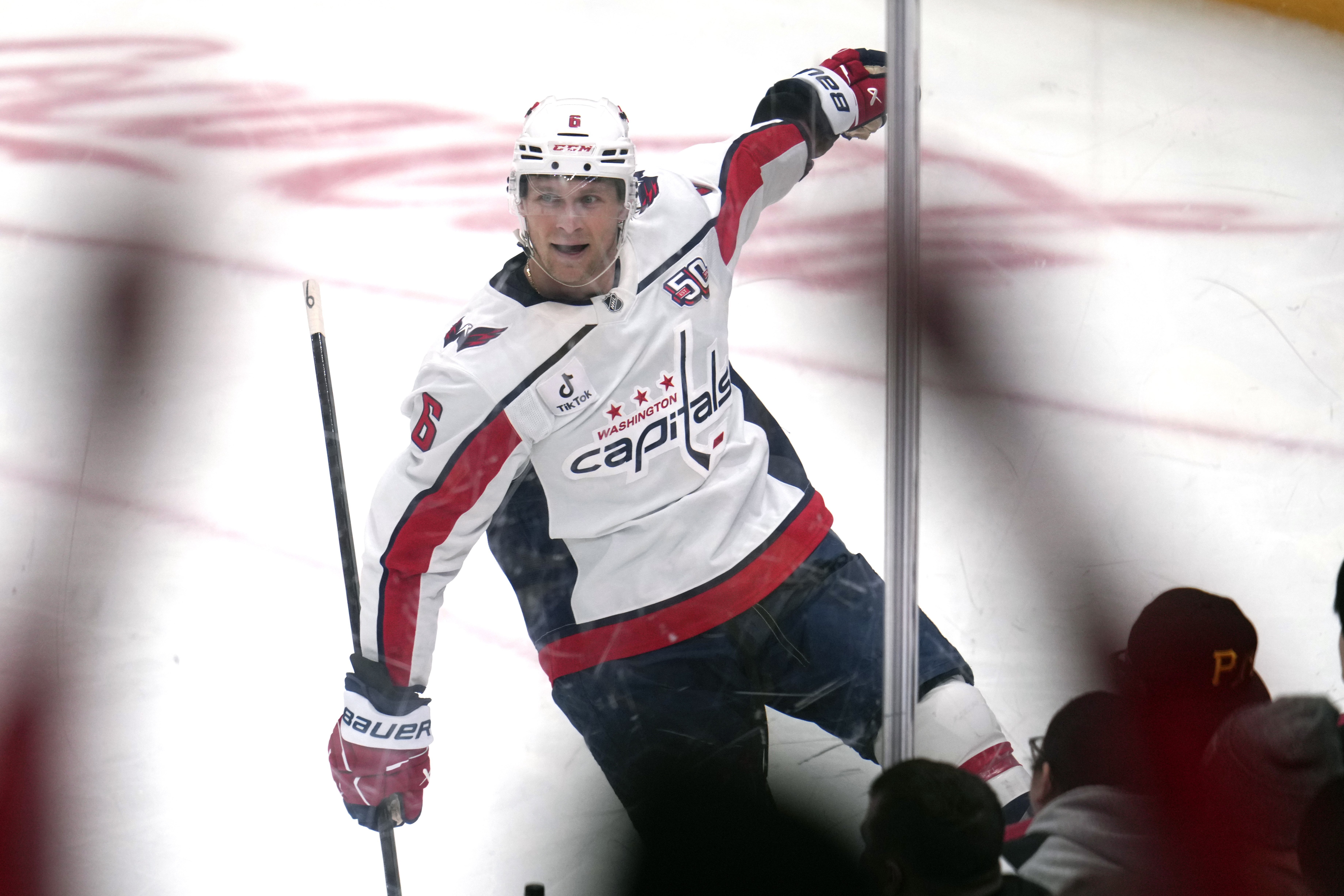 Washington Capitals' Jakob Chychrun (6) celebrates after scoring his first goal during the second period of an NHL hockey game against the Pittsburgh Penguins in Pittsburgh, Saturday, Feb. 22, 2025. 