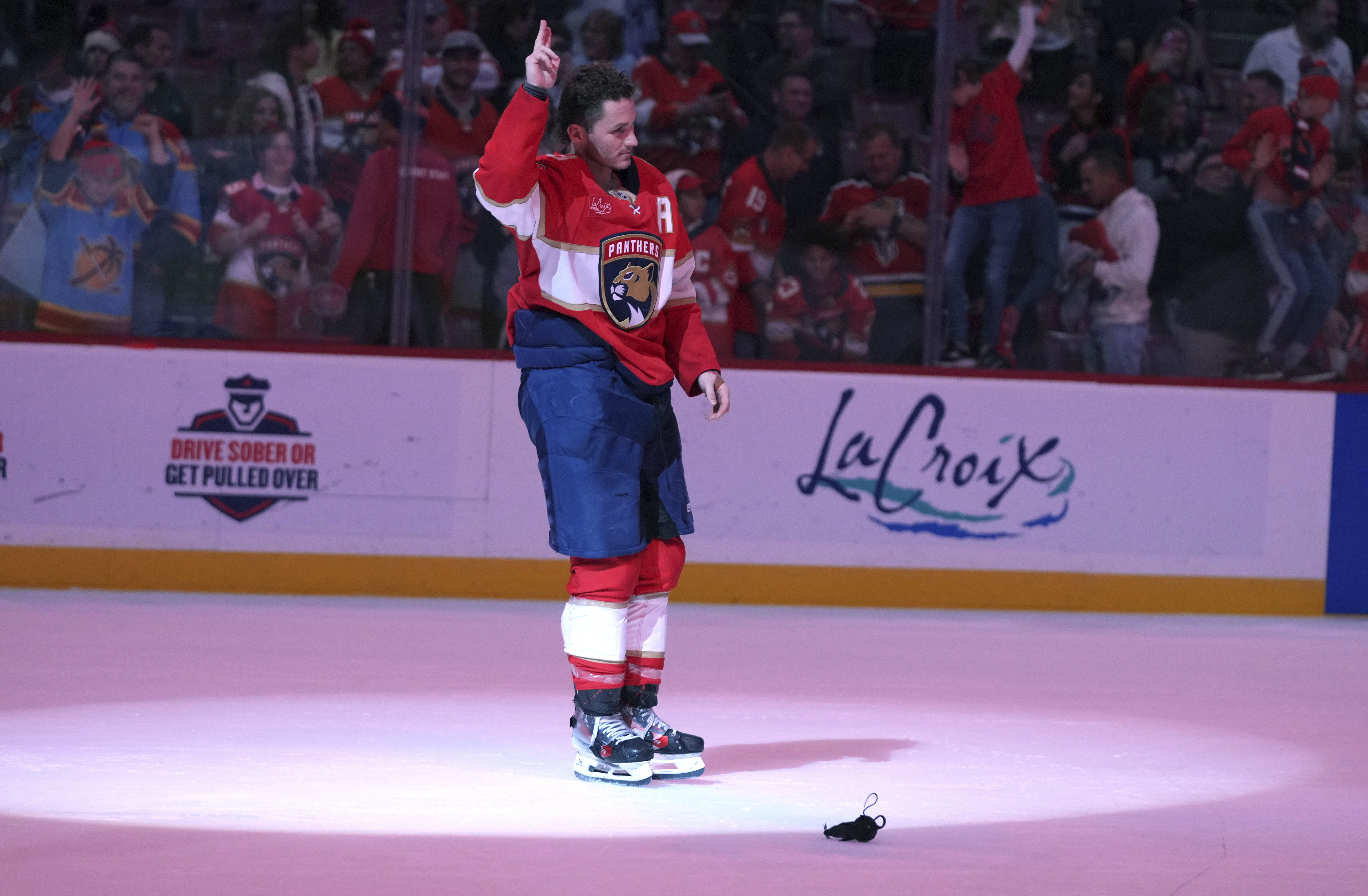 Florida Panthers left wing Matthew Tkachuk acknowledges the crowd after the Panthers defeated the Ottawa Senators in an NHL hockey game Saturday, Feb. 8, 2025, in Sunrise, Fla.