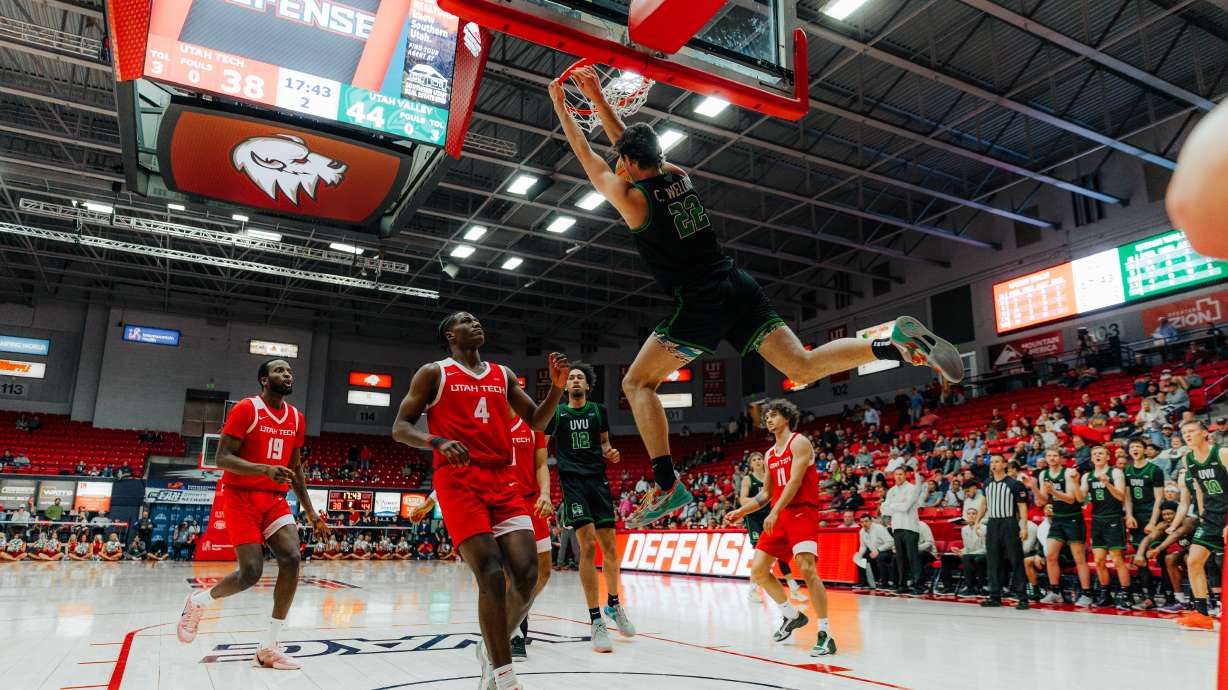 Carter Welling flying high for a dunk in a game versus Utah Tech where Utah Valley won 79-77.