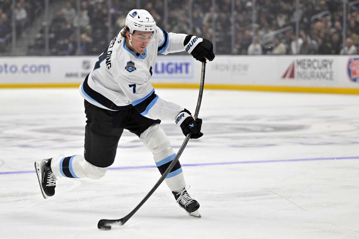 Utah Hockey Club defenseman Michael Kesselring takes a shot on goal during the first period of an NHL hockey game against the Los Angeles Kings, Saturday, Feb. 22, 2025, in Los Angeles.