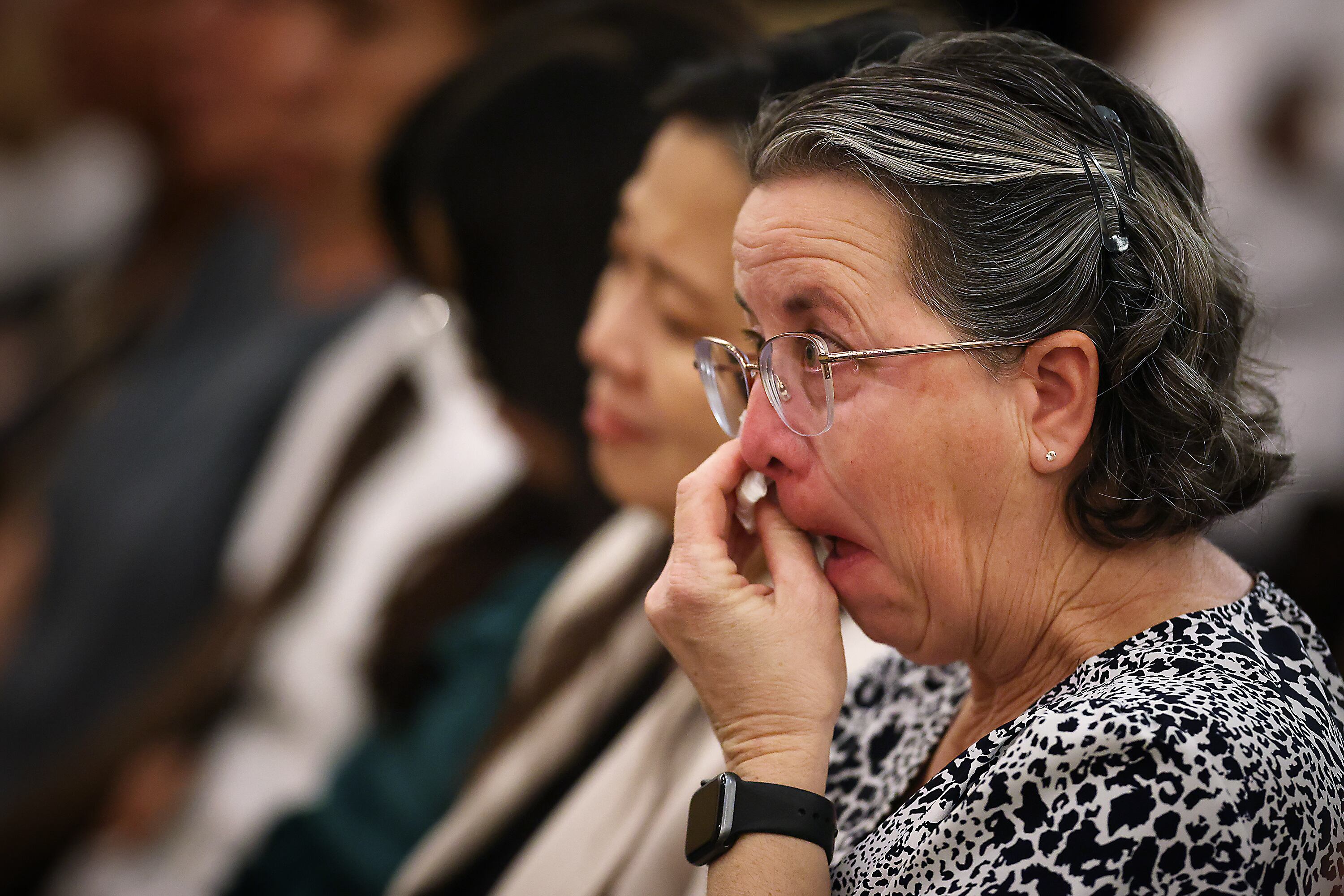 Patty Jones tears up as she listens to President Jeffrey R. Holland speak at the San Fernando California Stake Center on Saturday, in Van Nuys, Calif.