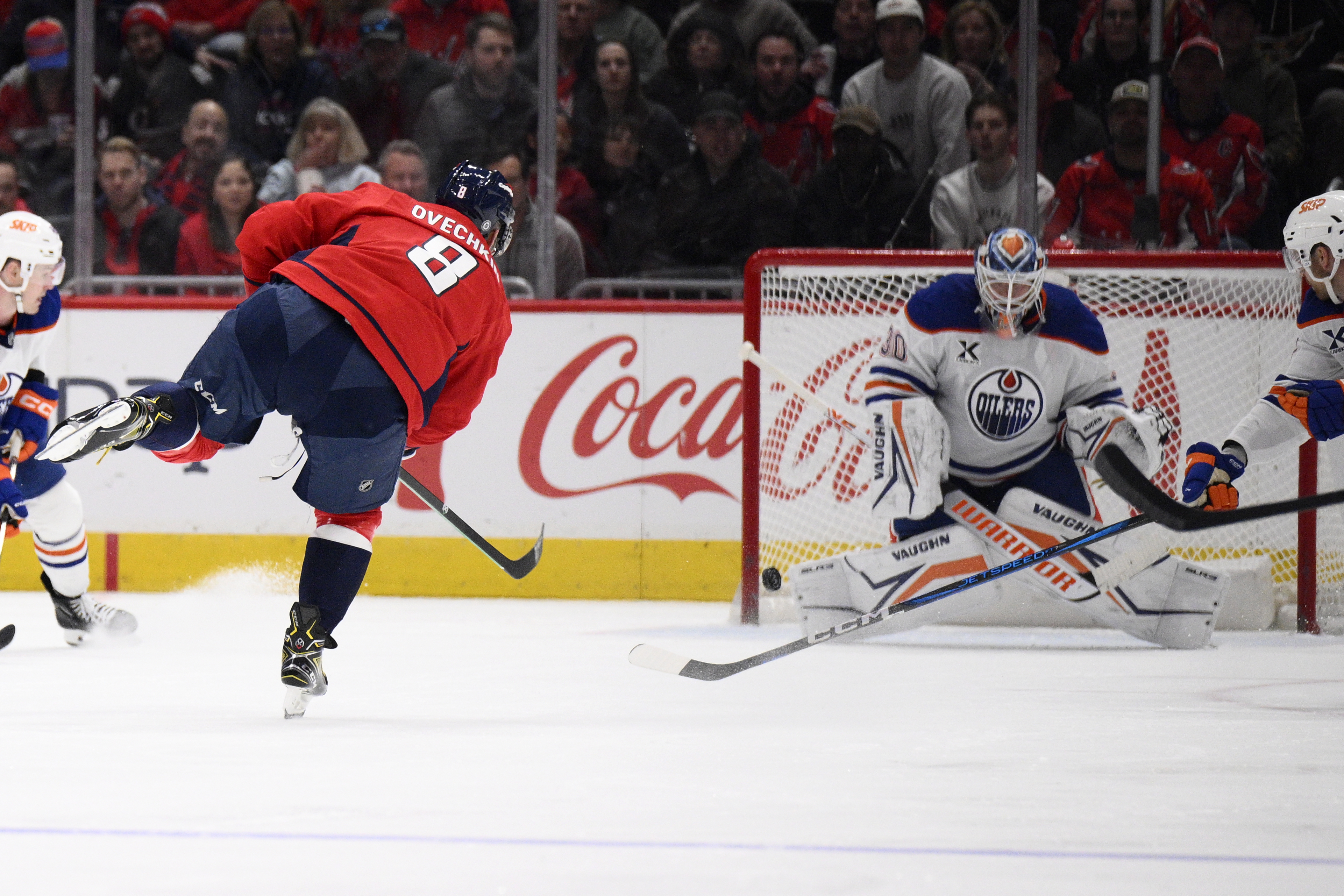 Washington Capitals left wing Alex Ovechkin (8) scores against Edmonton Oilers goaltender Calvin Pickard (30) during the second period of an NHL hockey game, Sunday, Feb. 23, 2025, in Washington. 