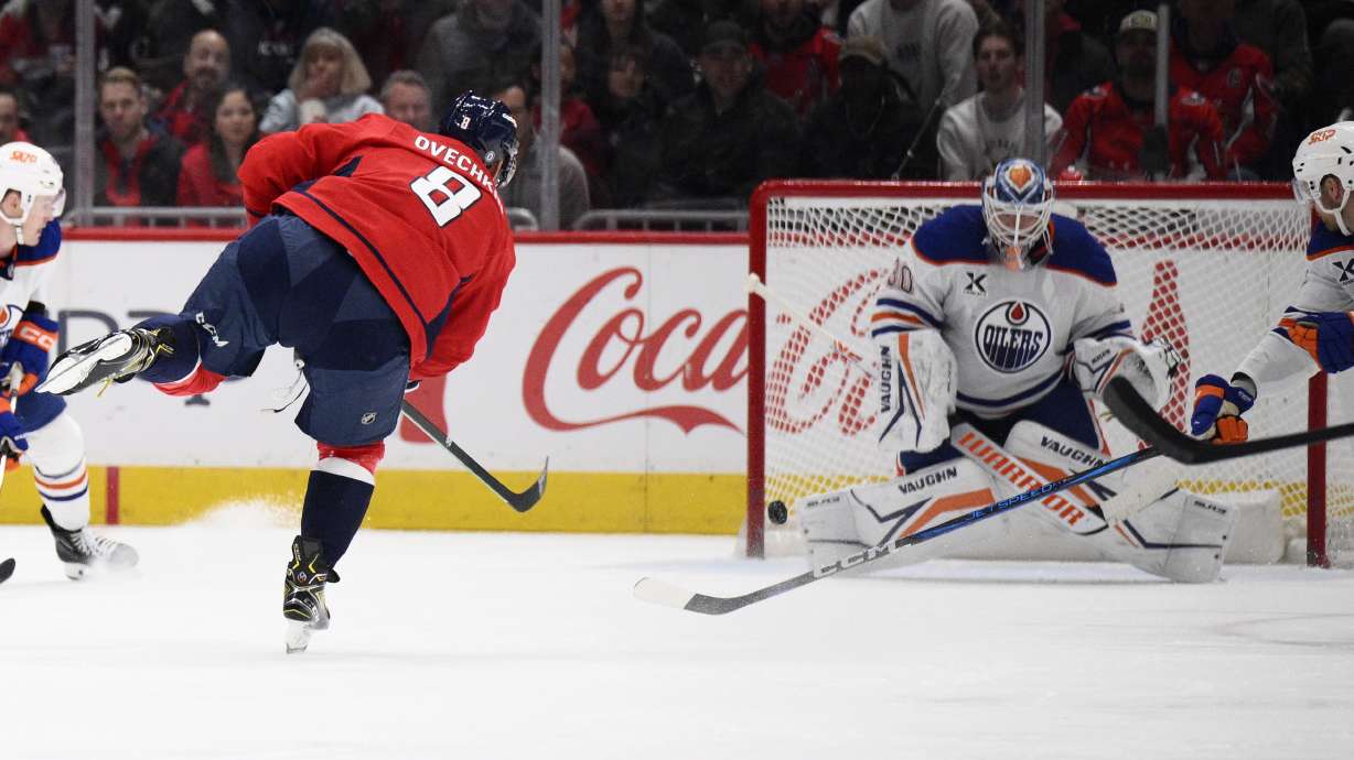Washington Capitals left wing Alex Ovechkin (8) scores against Edmonton Oilers goaltender Calvin Pickard (30) during the second period of an NHL hockey game, Sunday, Feb. 23, 2025, in Washington.
