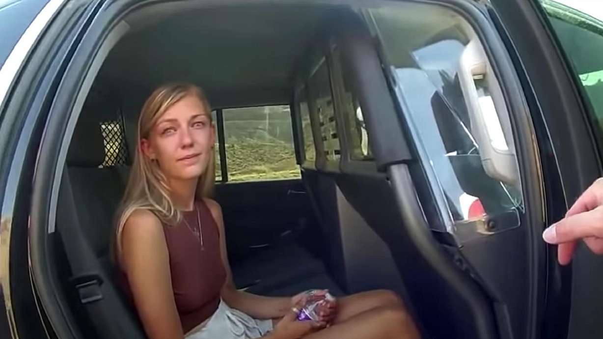 Body camera video provided by Moab police shows Gabby Petito talking to an officer after the van she was riding in was pulled over near Arches National Park on Aug. 12, 2021. A documentary about Petito uses an AI version of her voice.