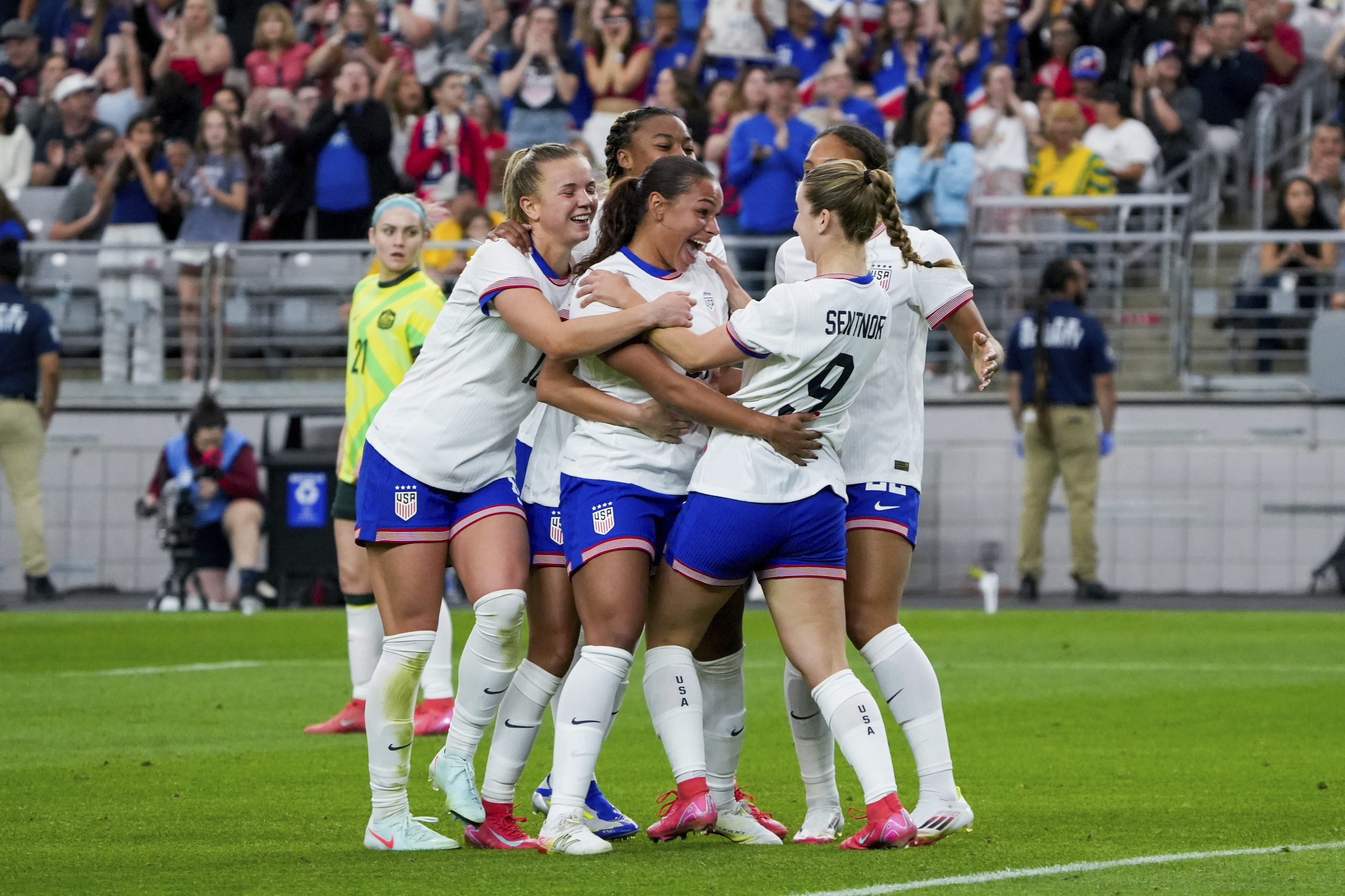 United States forward Michelle Cooper celebrates her first international goal with her teammates during the second half of a group stage match in the SheBelieves Cup women's soccer tournament against Australia, Sunday, Feb. 23, 2025, in Glendale, Ariz. 