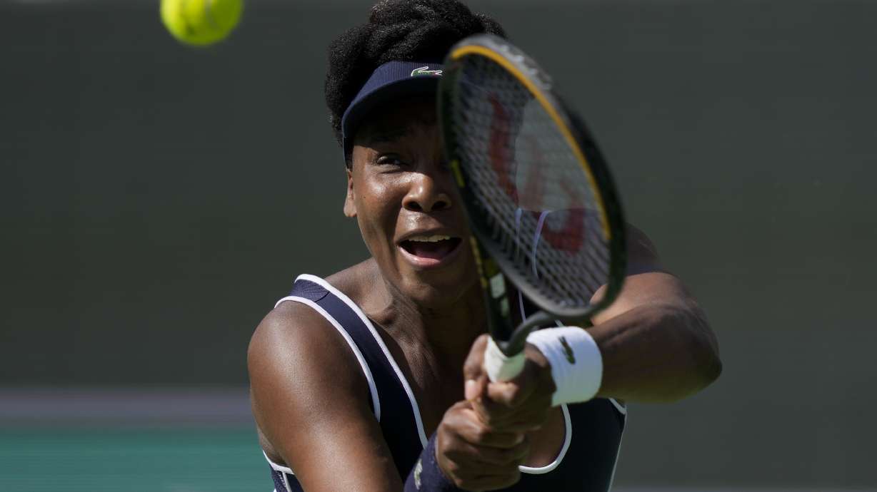 FILE - Venus Williams, of the U.S., returns to Nao Hibino, of Japan, at the BNP Paribas Open tennis tournament, March 7, 2024, in Indian Wells, Calif.