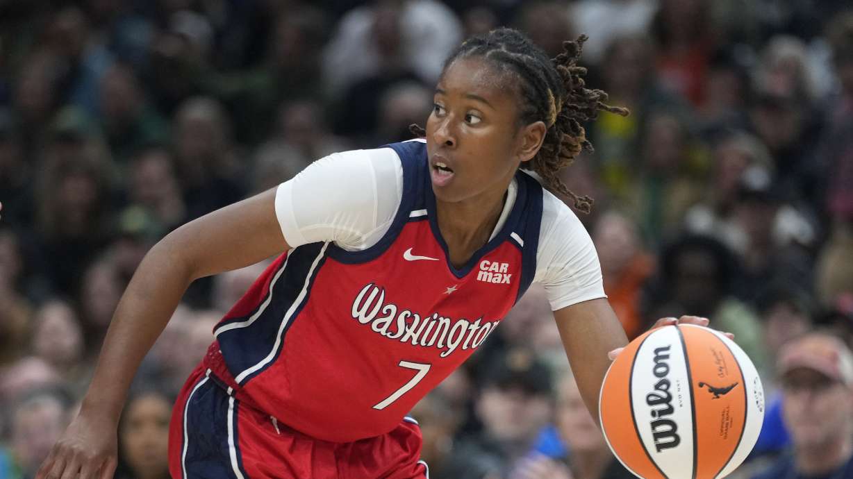 FILE - Washington Mystics guard Ariel Atkins (7) moves the ball against the Seattle Storm during a WNBA basketball game May 25, 2024, in Seattle.