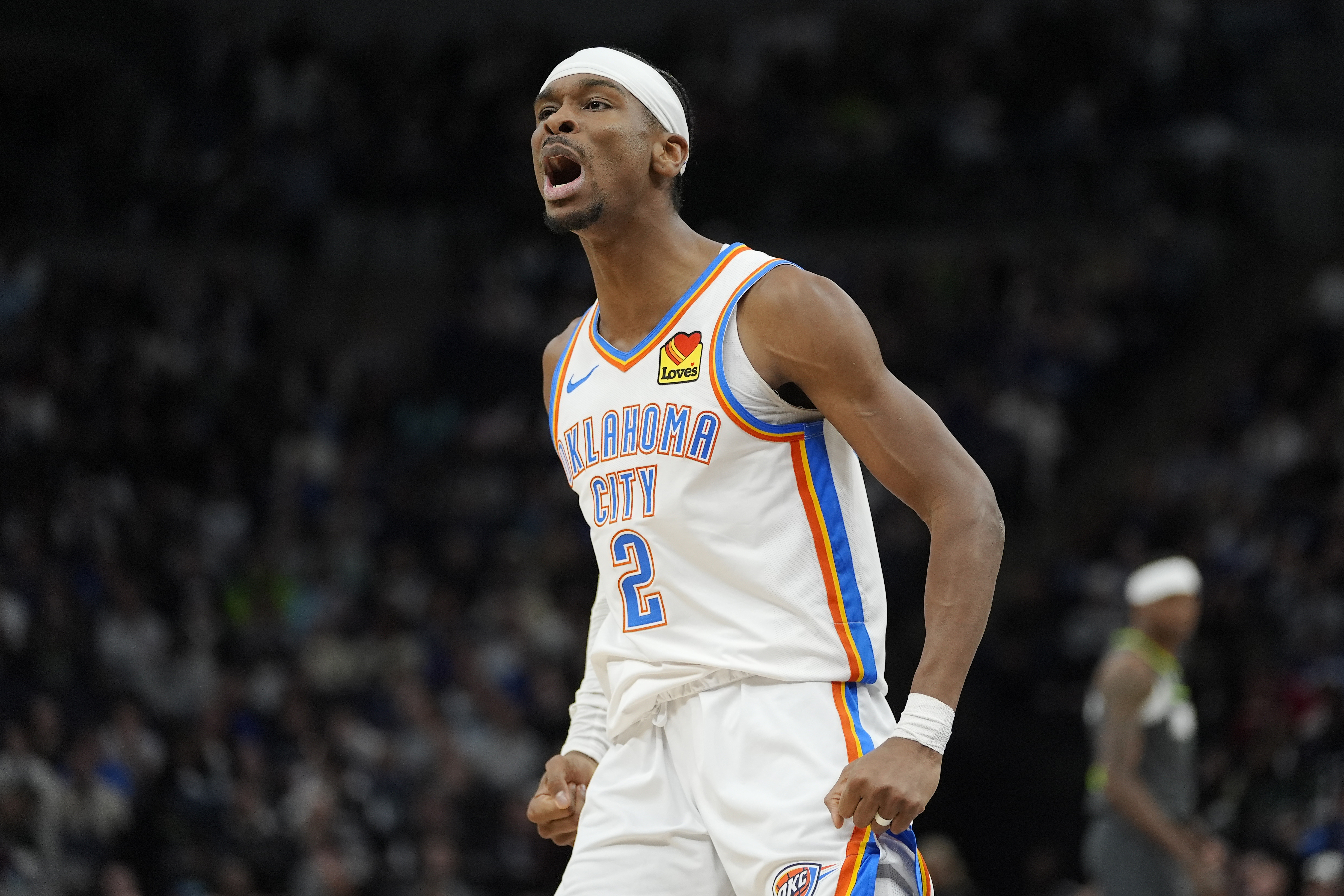 Oklahoma City Thunder guard Shai Gilgeous-Alexander (2) celebrates after making a three-point shot during the second half of an NBA basketball game against the Minnesota Timberwolves, Sunday, Feb. 23, 2025, in Minneapolis. 