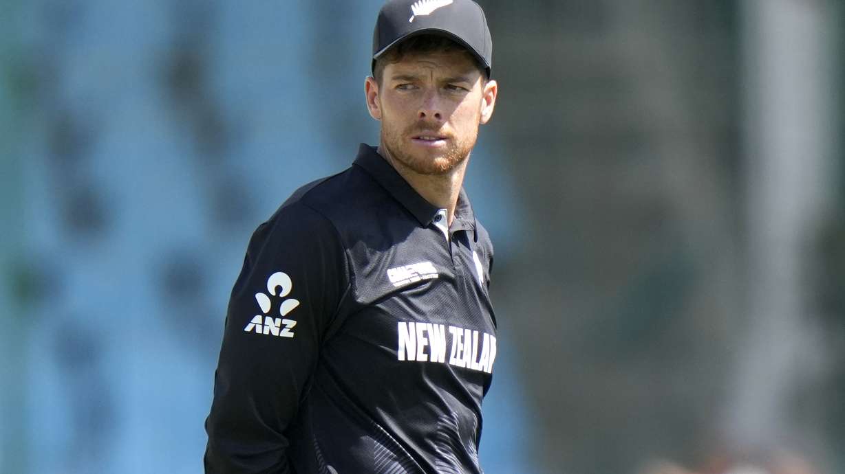 New Zealand's Mitchel Santner waits for coin toss before the start the ICC Champions Trophy cricket match between Pakistan and New Zealand, in Karachi, Pakistan Wednesday, Feb. 19, 2025.