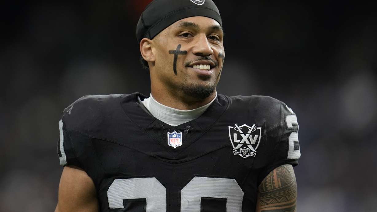 FILE - Las Vegas Raiders safety Isaiah Pola-Mao (20) stands on the field before an NFL football game against the Los Angeles Chargers, Jan. 5, 2025, in Las Vegas.