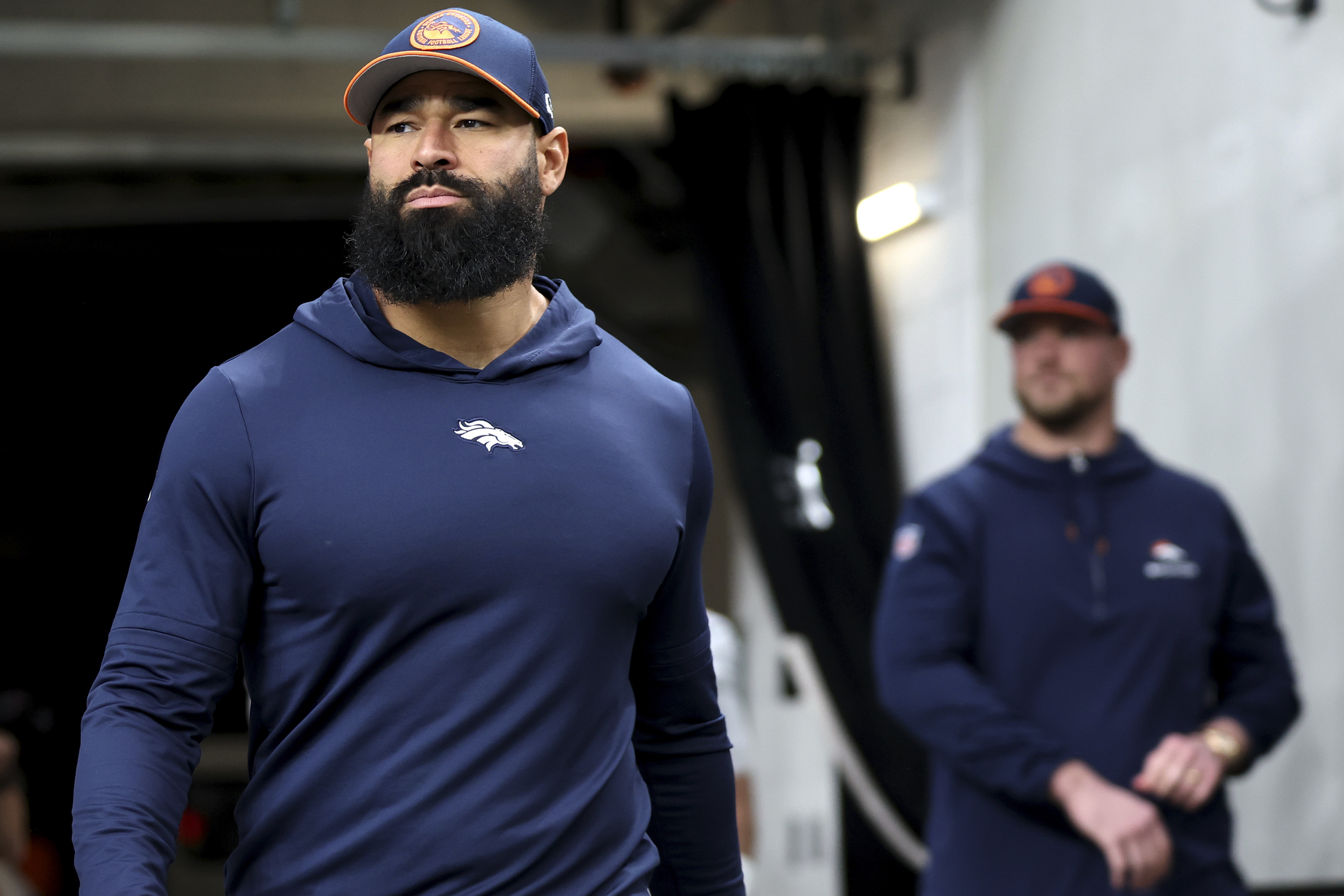 FILE - Denver Broncos outside linebackers coach Michael Wilhoite takes the field before an NFL football game against the Las Vegas Raiders, Jan. 7, 2024, in Las Vegas. 