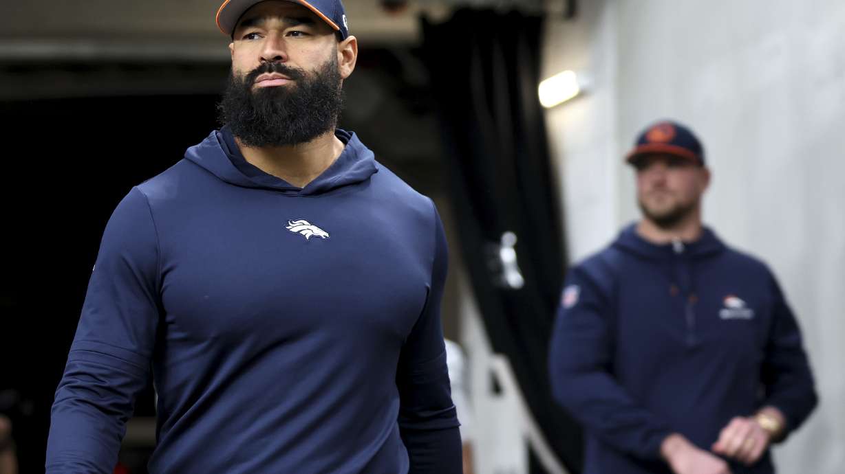 FILE - Denver Broncos outside linebackers coach Michael Wilhoite takes the field before an NFL football game against the Las Vegas Raiders, Jan. 7, 2024, in Las Vegas.