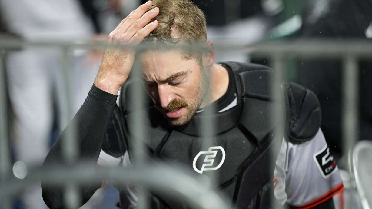 FILE - San Francisco Giants catcher Tom Murphy walks to the clubhouse during the second inning of a baseball game against the Philadelphia Phillies, May 4, 2024, in Philadelphia.