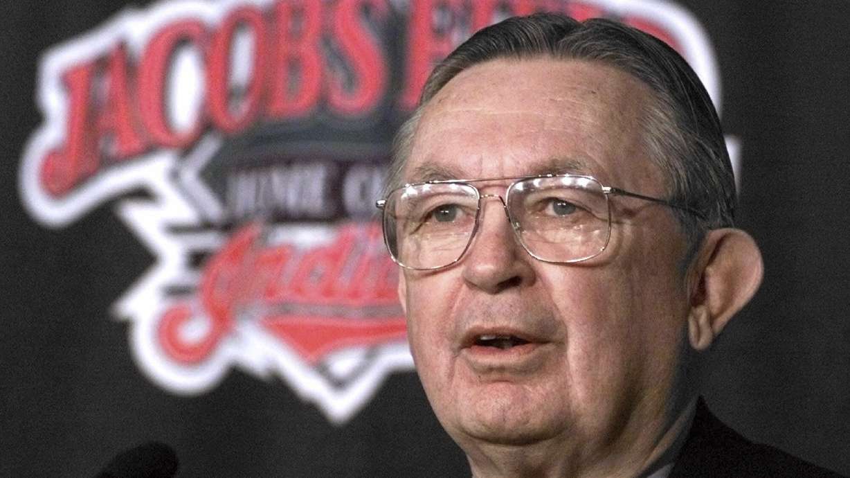 FILE - Attorney Larry Dolan answers questions at a news conference in Cleveland after Cleveland Indians owner Richard Jacobs announced an agreement to sell the team to Dolan, Nov. 4, 1999.