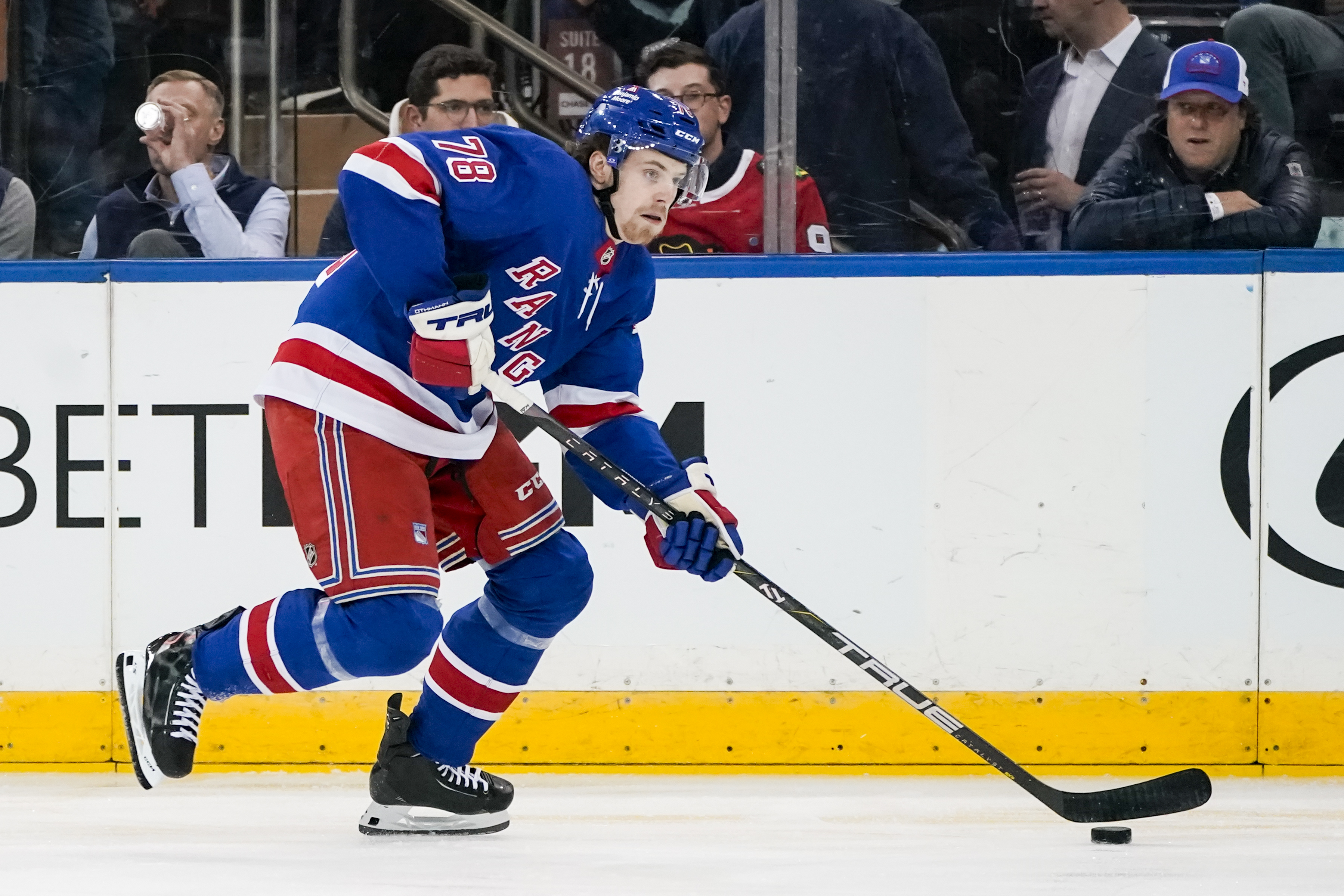 FILE - New York Rangers left wing Brennan Othmann (78) looks to pass the puck during the first period of an NHL hockey game against the Chicago Blackhawks in New York, Jan. 4, 2024.