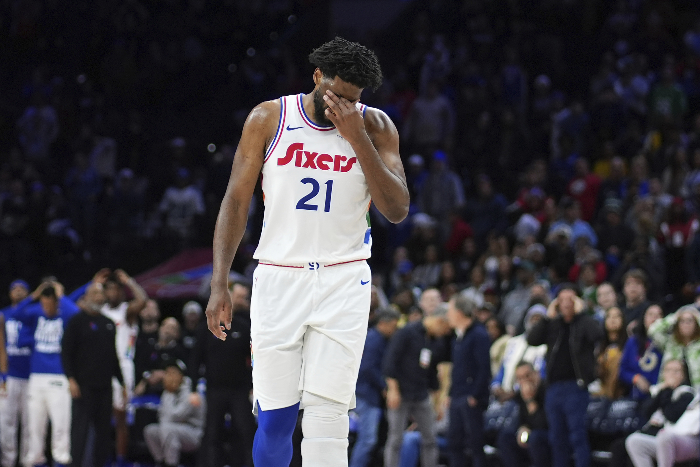 Philadelphia 76ers' Joel Embiid reacts after missing a shot during the second half of an NBA basketball game against the Toronto Raptors, Tuesday, Feb. 11, 2025, in Philadelphia. 