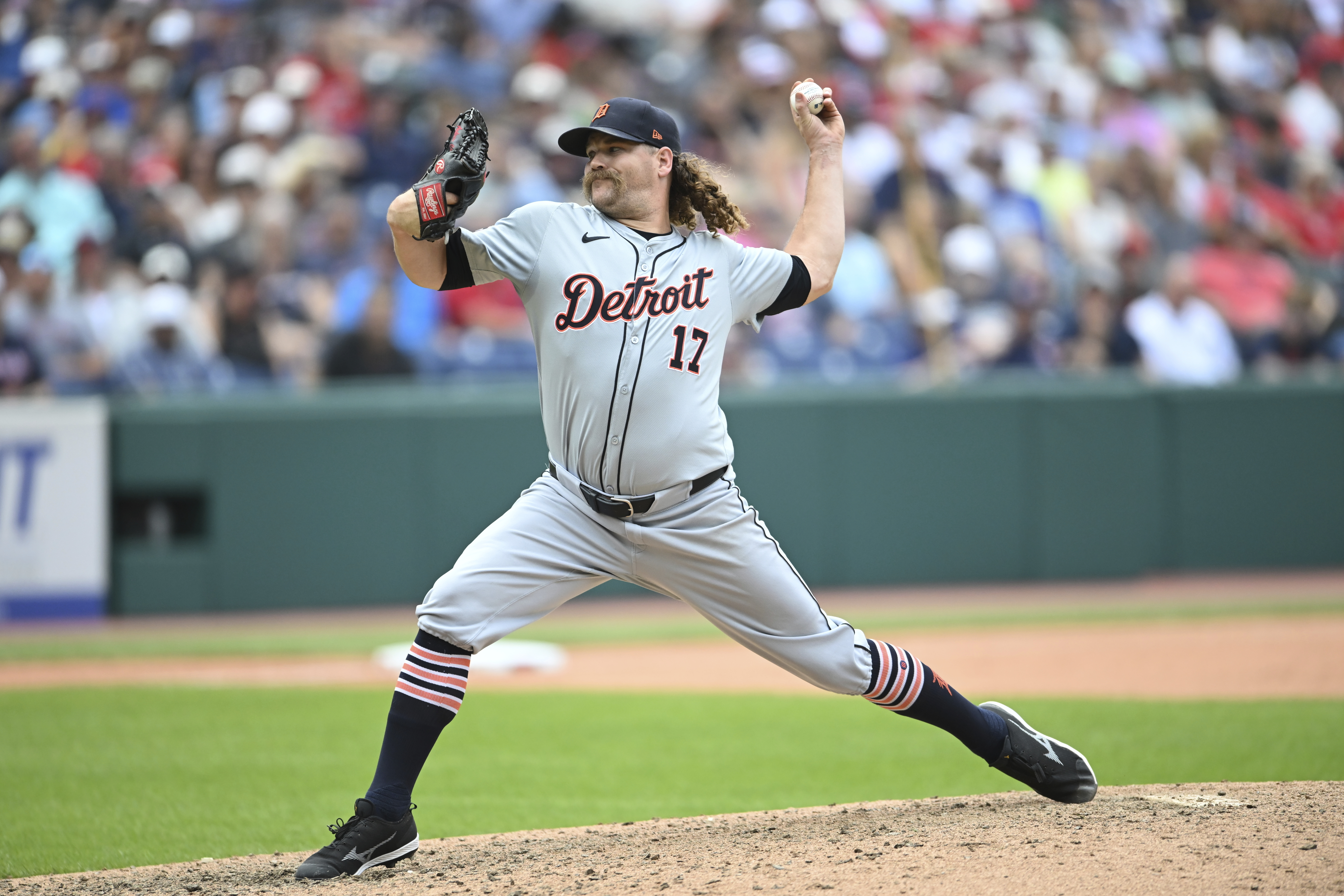 FILE - Detroit Tigers relief pitcher Andrew Chafin delivers during the eighth inning of a baseball game against the Cleveland Guardians, July 25, 2024, in Cleveland. 