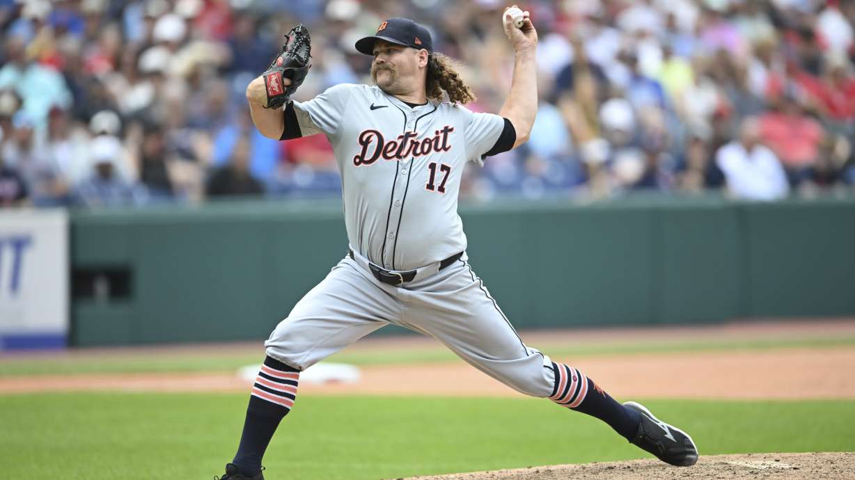 FILE - Detroit Tigers relief pitcher Andrew Chafin delivers during the eighth inning of a baseball game against the Cleveland Guardians, July 25, 2024, in Cleveland.